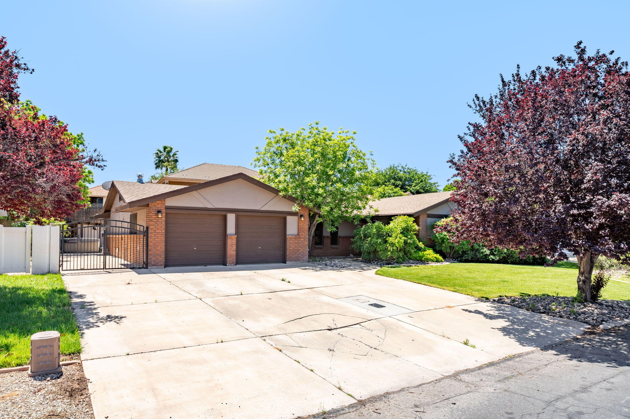 Updated and move-in ready 3-bedroom, 2-bath home with two spacious family rooms, private pool and hot tub, plus extra parking. Just minutes from the golf course and city trails.