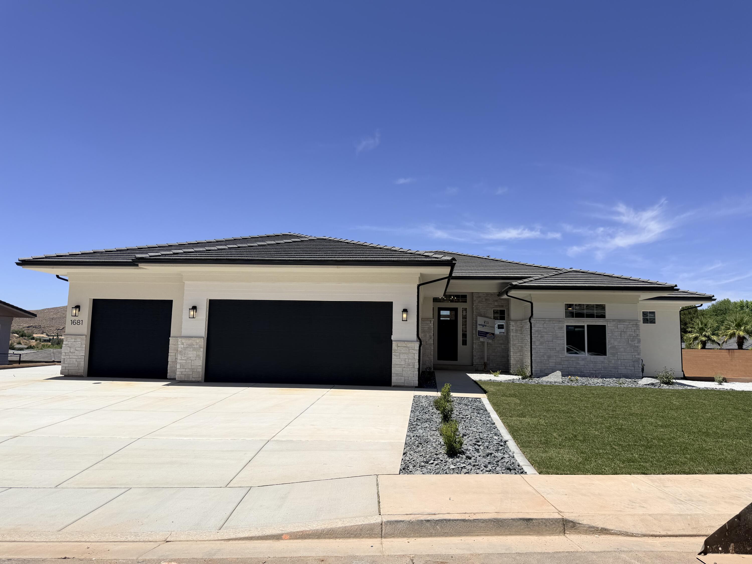 Beautiful home located in the highly sought-after Cottam Cove subdivision featuring a walk-out basement and upgraded natural stone exterior. Inside you'll find custom cabinetry, premium Bosch appliances, and Moen fixtures throughout. Built with energy-efficient radiant barrier sheeting, this home combines quality craftsmanship with modern comfort. Enjoy stunning mountain and valley views that create the perfect backdrop for everyday living. Home to be completed in about 2 weeks. Basement has been roughed for future kitchen, baths and laundry.
