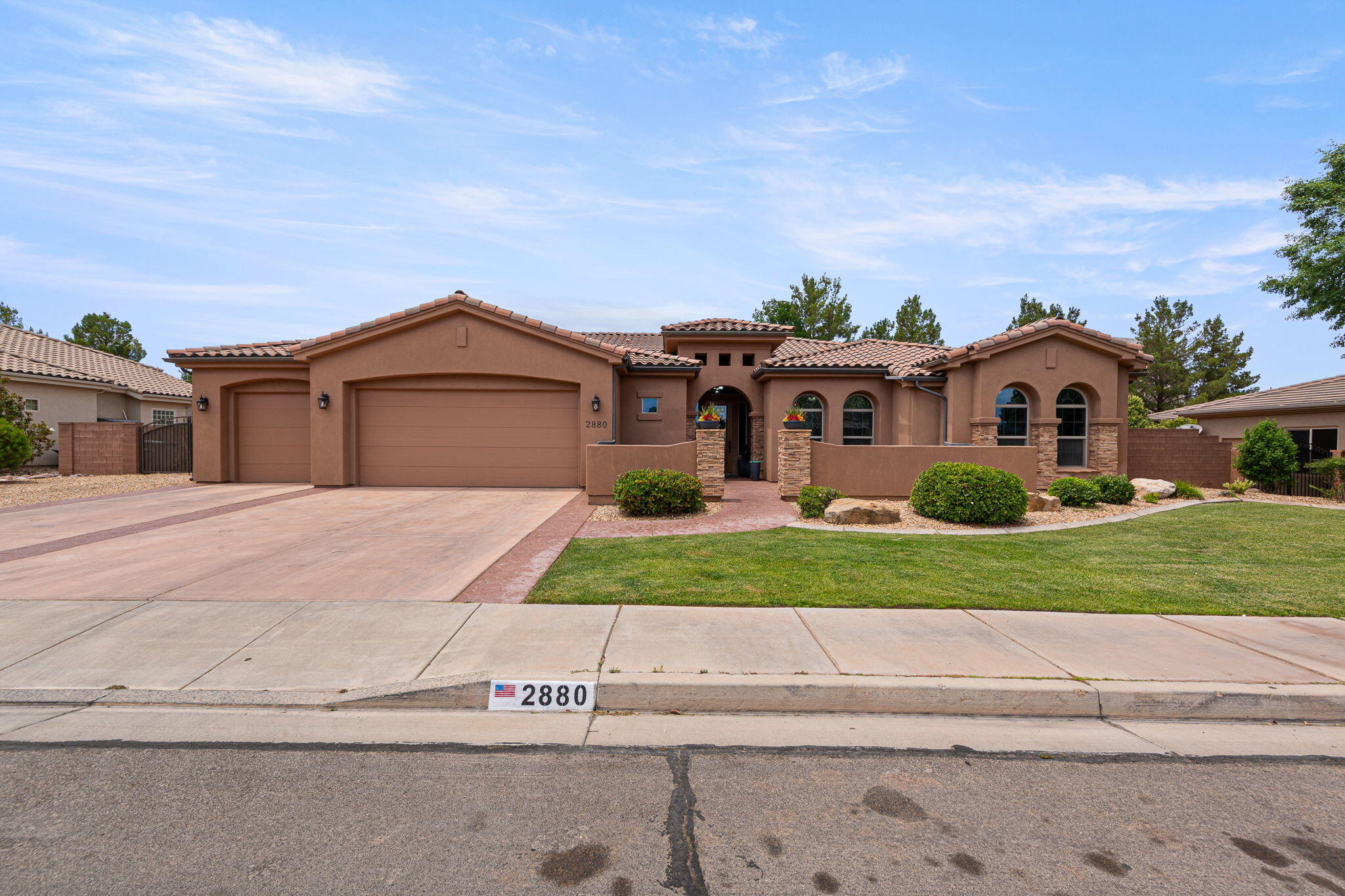 This beautiful home features an open concept  layout, great room with 12' tray ceilings and was completely repainted. Kitchen has granite counter tops, built in stainless appliances, walk in pantry. Master suite is oversized with large walk in closet, jetted tub and walk in shower. Large storage room in garage. The backyard has a hot tub pad and is large enough to add a pool. The front has a charming courtyard, and extra parking as well as RV parking. fully fenced and tree lined to ensure privacy. Conveniently located near parks, schools, pickle ball courts, soccer fields, biking trails and hiking trails. Home is on Dixie Power.