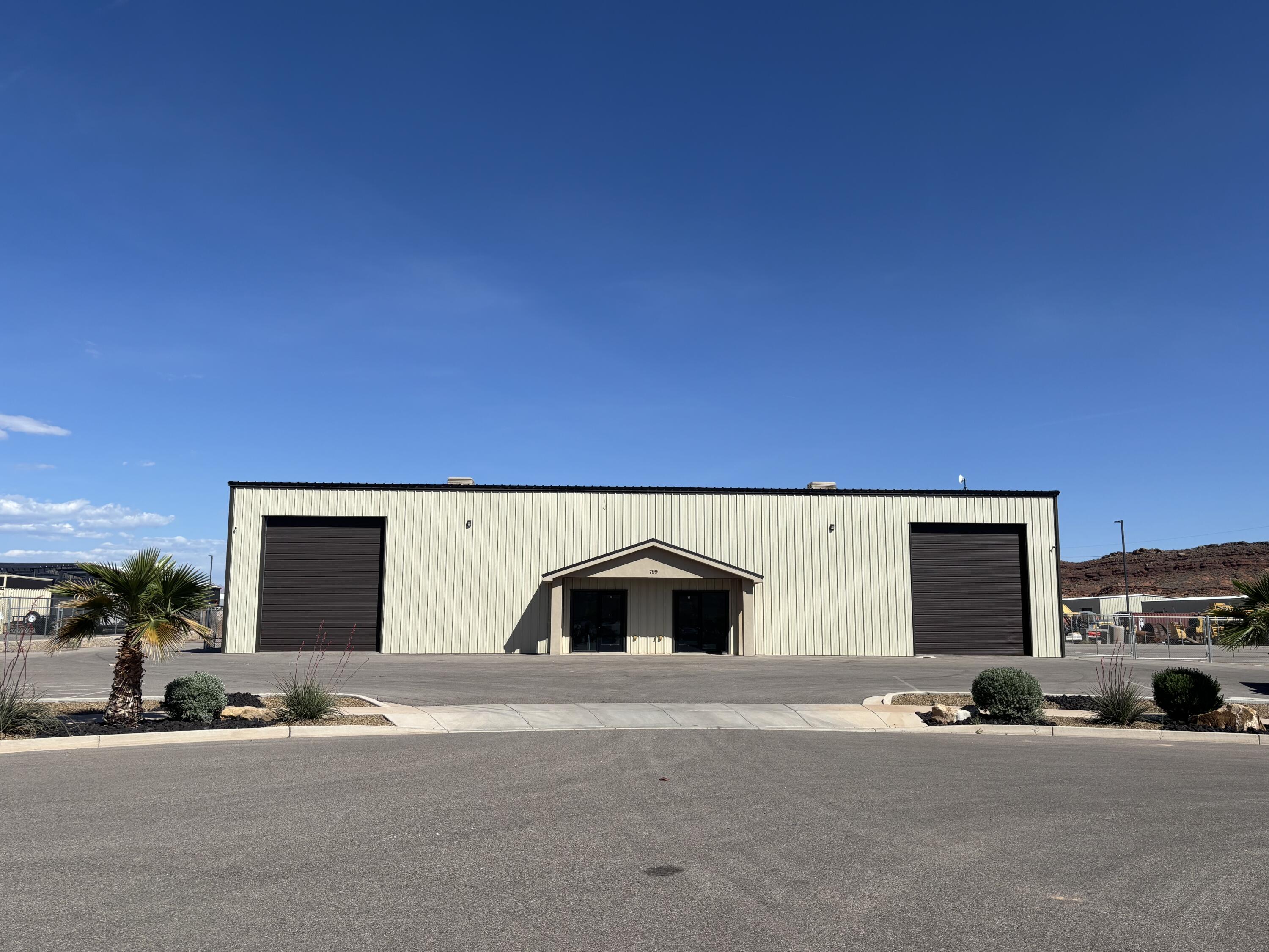 Excellent opportunity to own a well-maintained commercial property ideal for industrial use. This versatile building is designed to accommodate either a single tenant or dual tenants, offering flexibility for a variety of business operations. The north side is currently leased at $3,800/month with a lease in place through September 2027, providing immediate income potential. 7% Pro Forma Cap Rate.
The property features a large, fully fenced yard--perfect for storage, equipment, or operational needs. The building includes four 14'x16' roll-up doors, allowing easy access for large vehicles and equipment. Inside, you'll find a clean, well-cared-for space with A/C and electric heat for year-round comfort.
Conveniently located with quick access to I-15, this property offers excellent connectivity for distribution, logistics, or service-based businesses. A rare combination of functionality, income potential, and location.