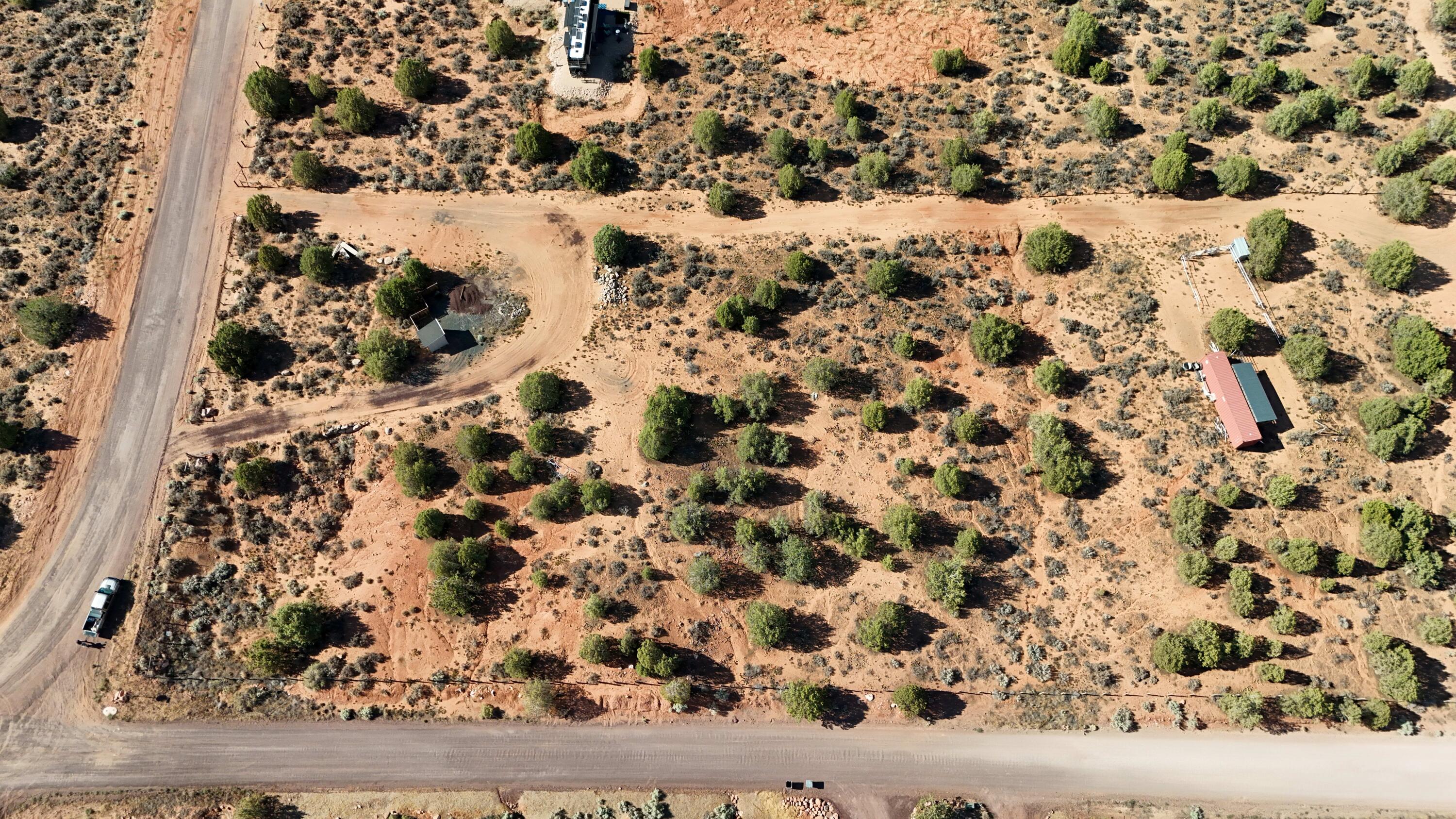3 Acre Building Lot - Red Cliff Views in Apple Valley, UT. Build your dream home on this stunning 3-acre lot framed by red cliffs, with sweeping north-facing views. The natural slope makes it ideal for a walkout basement plan. Water is on the lot with impact fees paid. Power available once a building permit is approved (not yet on lot); septic required, not yet installed. Quiet, rural setting with phenomenal new homes going up nearby and clear, star-filled night skies. A rare chance to own land in one of southern Utah's most scenic and up-and-coming areas.
