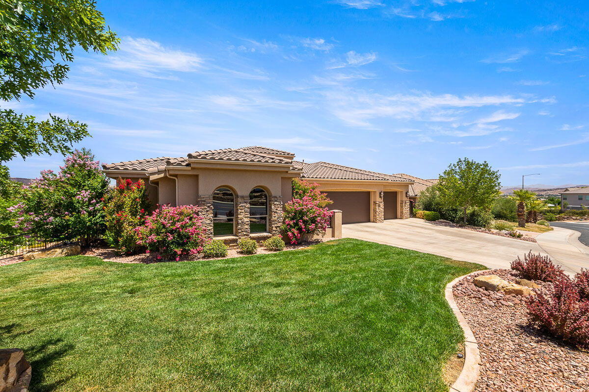 You have located the perfect home with multi-million dollar views of St. George City & Pine Valley Mountain!Awesome Southgate Hills neighborhood & close to many amenities that surround, including Southgate Golf Course.Home was custom built by Sunwest Homes. All countertops throughout the home are granite. Tile floors mixed in with distressed hardwood maple flooring. All cabinets & shelving are a mix of Cherry wood & Alder . Home has 8' stained solid core doors throughout. 3 custom gas fireplaces, two kitchens, as well as 2 Master bedrooms! Main kitchen comes with induction cook top, advatium oven & microwave, warming oven & trash compactor. Laundry rooms on both floors. Crown moulding stained/painted Alders in all bedrooms & Family room.Custom wrought iron fencing around the home. Beautiful, private salt water pool & hot tub. Separate area in backyard that includes Adirondack chairs & custom fire pit! Most Furniture will be included!