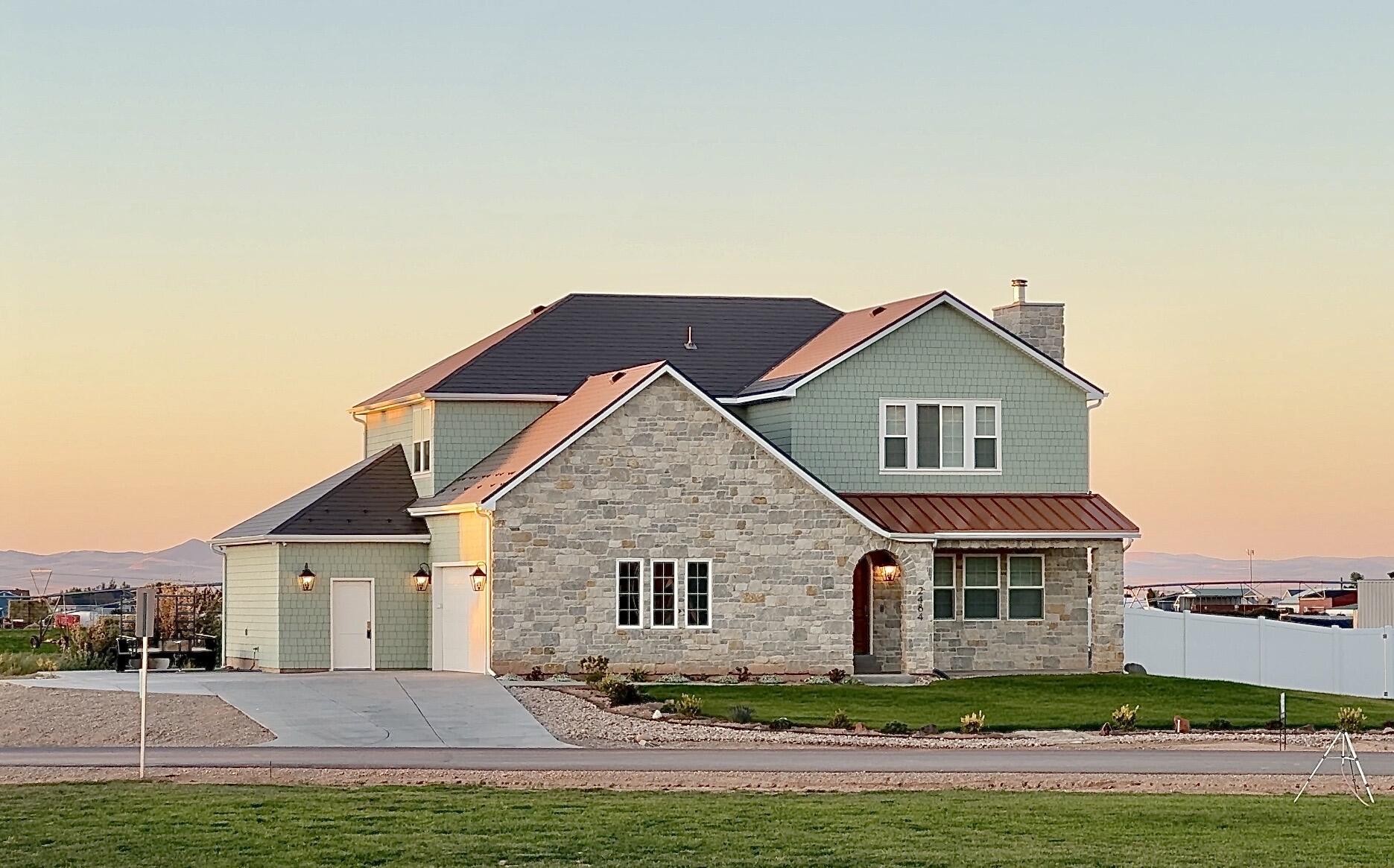 This custom home, built in 2023, showcases timeless features, durability and traditional craftsmanship while still embracing modern simplicity, functionality and comfort, a true standout from today's low-quality material trends.  

Enjoy these upgrades and more: 
Grand primary suite (22' x 12') with a view of cedar canyon, white oak hardwood floors, solid wood cabinets and trim, 100-year aluminum shingle roof, real stone masonry paired with Hardie shake siding, solid antique brass fixtures, a Napoleon wood burning fireplace...

All set in a peaceful country neighborhood, on nearly an acre with No HOA, 10 minutes from town...

9-foot ceilings on the main, 2nd floor and basement.
Large designer kitchen with 8'5' island. 
Grade A quartz silestone countertops. 
Extra-large 11'x6' walk-in pantry.  
Warm neutral colors. 
 
Multigenerational living with main floor guest bedroom next to full bathroom. 
Basement finished through drywall.
Extra-wide staircase with solid oak handrail. 
Classic 7-inch tall baseboards. 
Oversized 2.5 car garage - 25 feet deep.

High Performance: 2 HVAC systems, Rockwool insulation in all interior walls and floors for energy efficiency. 
Fiber internet Cat6 in every room, security camera ports on all exterior corners.  
Home office. 
 
Water softener and tankless water heater. 
Full RV hookup pad. 
And More... 

Contact us for a full list of premium features or schedule a showing to see for yourself.