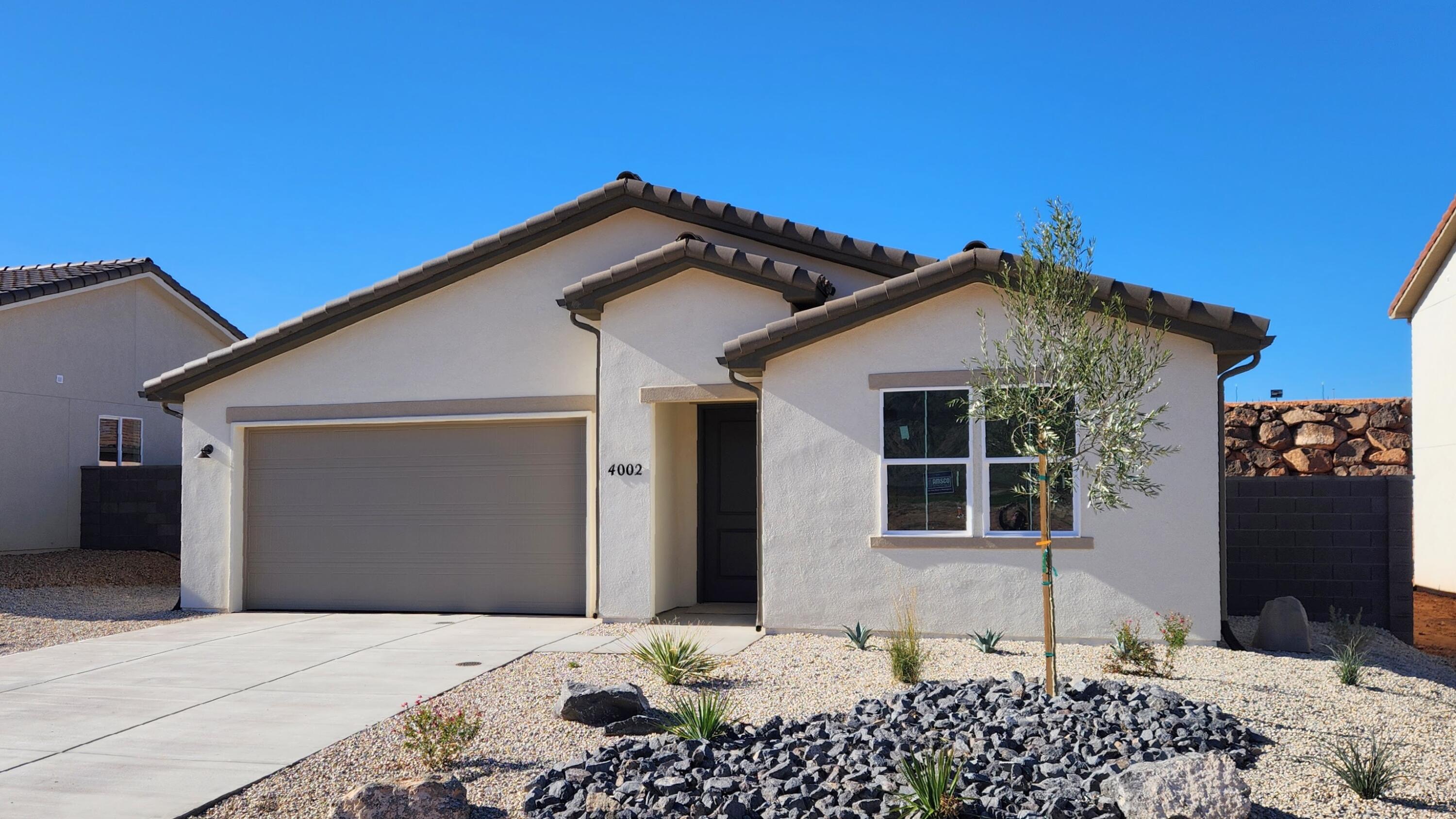 NEW Construction! Builder offering Special Financing when using preferred lender. Find your dream home at Cordero! Nestled between Copper Rock and Southern Shores, this exciting Hurricane community offers impressive desert and mountain scenery, with ample outdoor recreation opportunities at nearby golf courses and Sand Hollow State Park. Right off Southern Parkway, residents will enjoy easy access to the shopping, dining, entertainment and employers. The neighborhood showcases an inspired array of designer-curated homes, each boasting a flexible layout and the in-demand features today's homebuyers are seeking. The home includes a fireplace and covered patio. Buyer to verify all information.