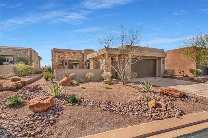 BUILT IN 2020 SO NO UPGRADES NEEDED!!
New paint in 2025. Nice private open courtyard in front of home with beautiful views of the red rock mountain morning and evening! The backyard is private and has a view across Entrada's golf course and of the Utah mountains. The back windows have remote see thru shade blinds. Each bedroom has ensuite bathroom plus a half bath for guests. Great floorplan! RO system and water softener.. Big 2 1/2 car garage!