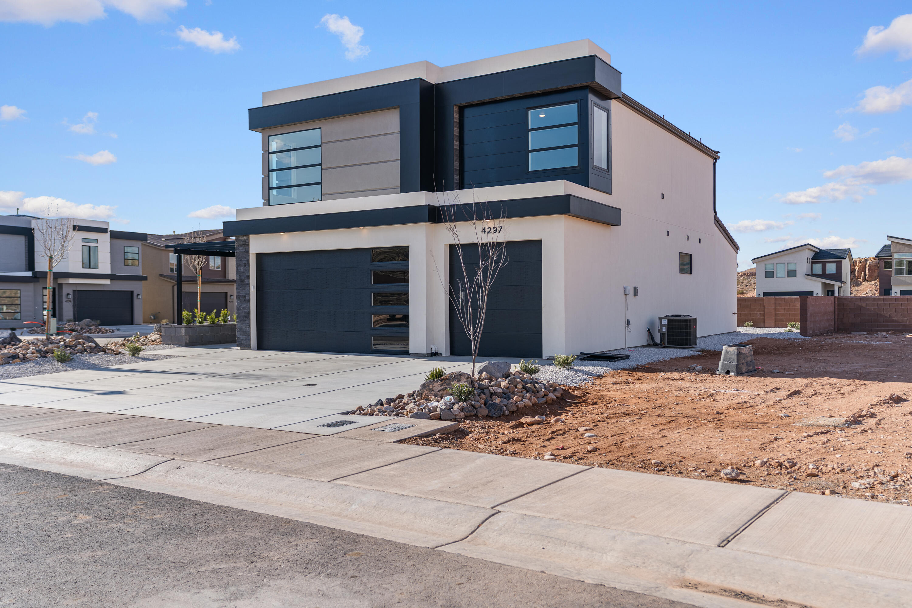Spacious 3-car garage home featuring 4 bedrooms with 2.5 bathrooms, located in the brand-new Desert Reflection community by Salisbury Homes. The open layout includes EVP flooring in the main living areas and bathrooms, upgraded carpet in bedrooms, quartz countertops throughout, modern cabinetry, a stylish kitchen backsplash, and stainless steel gas appliances (fridge not included). Enjoy nearby community parks, trails, and amenities. Interior and exterior finishes are predetermined and subject to change; photos are examples only. Buyer and agent to verify all information.