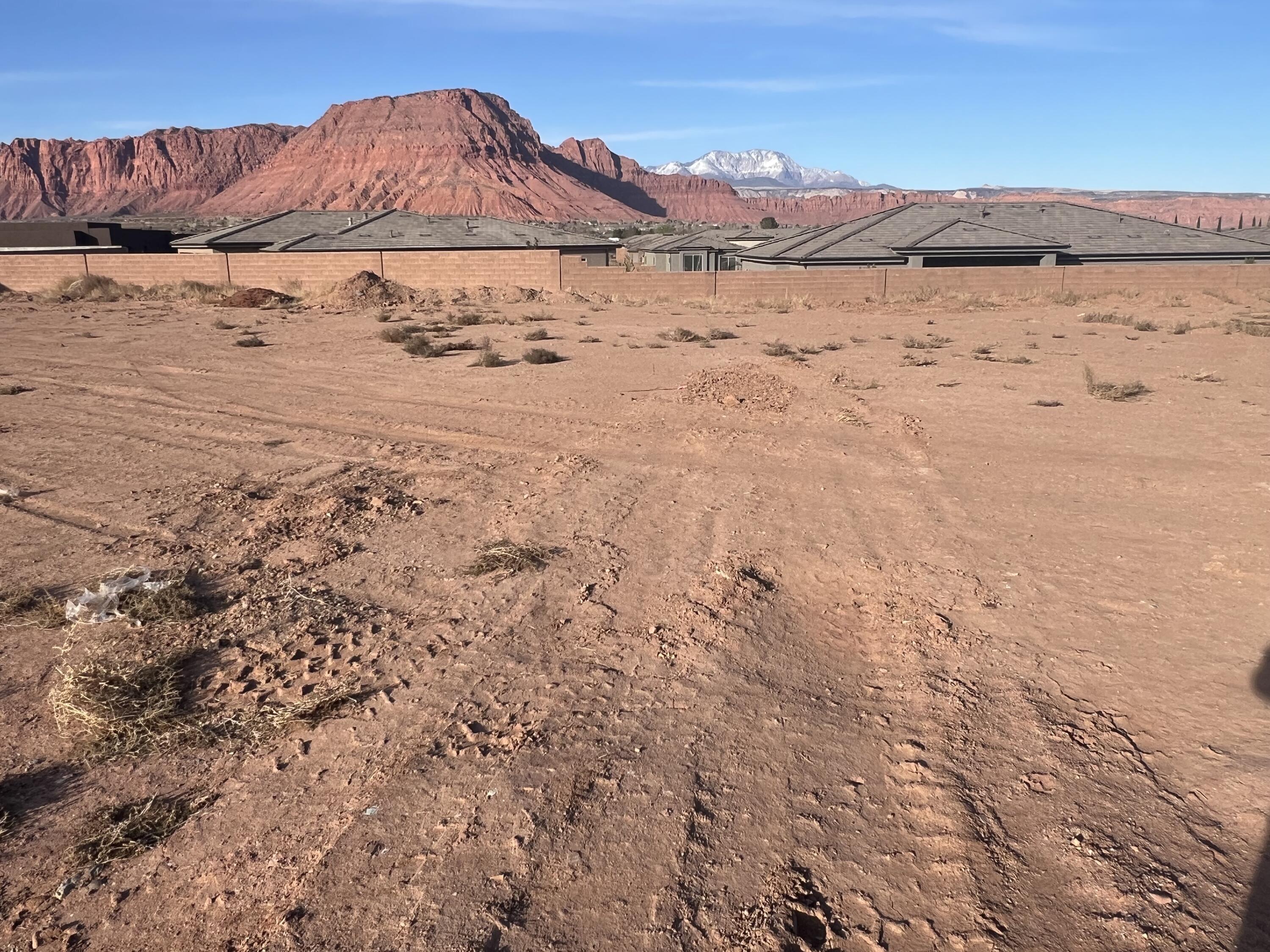 FANTASTIC VIEWS OF PINE VALLEY MOUNTAIN. THE RED MOUNTAIN IN IVINS AND THE CITY OF IVINS. A HOUSE BUILT ON THIS LOT MUST BE FLAT ROOFED, ONLY 14 AND A HLAF FEET HIGH AND APPROVED BY THE DEVELOPER. BUILDER HAS TO BE APPROVED BY THE DEVELOPER.