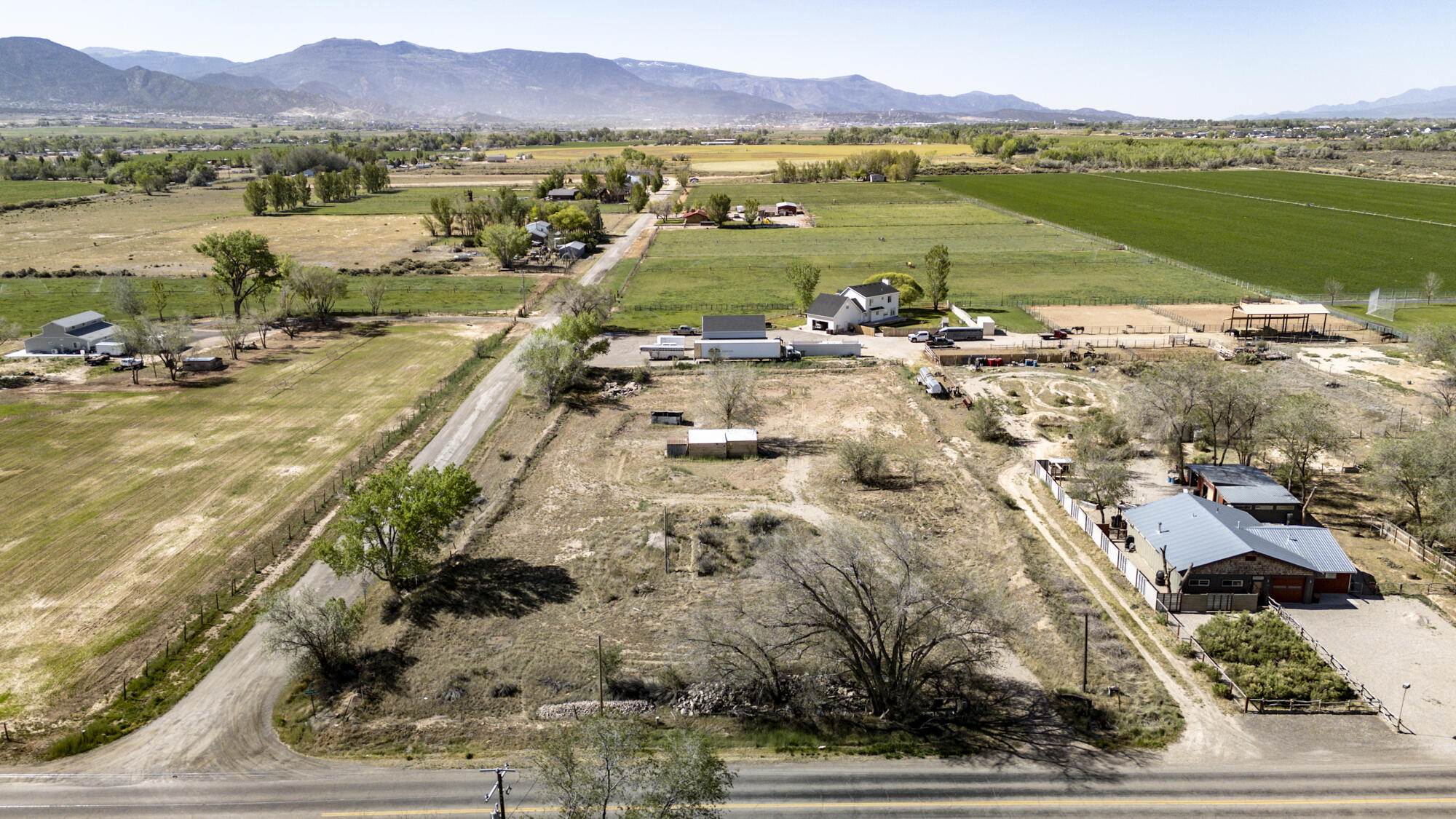 1.81 Acre corner lot in Iron County zoned commercial with many uses and endless opportunity and possibilities. Shared well & 3.27 Acre Feet of Water included. (3 from 73-718 with priority date of 1934 & 0.27 AFW from 73-1833 with priority date of 1955). Sold as-is. Buyer to verify.