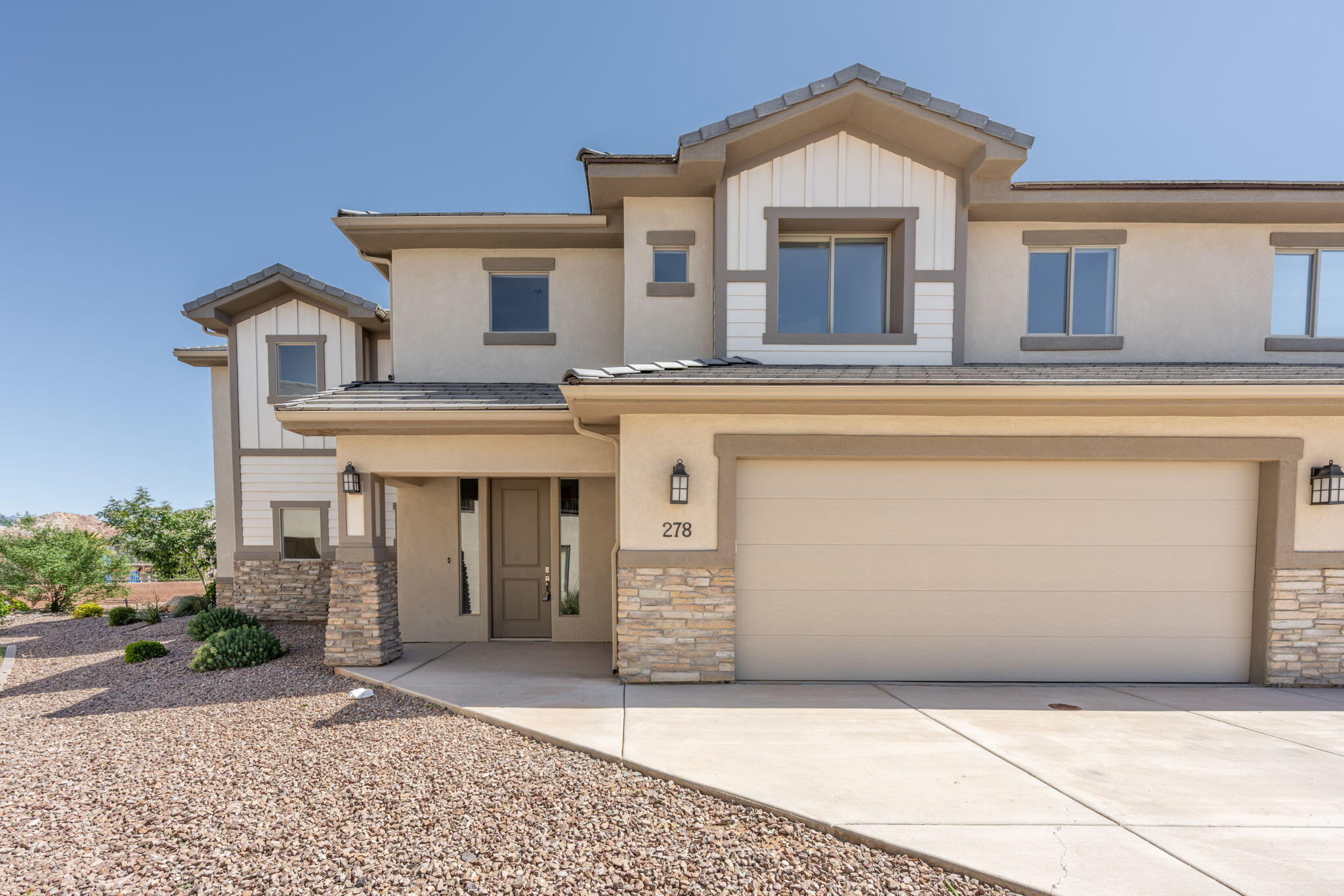 Experience upscale desert living in this beautiful 6-bedroom, 4.5-bathroom townhome offering over 3,500 sq/ft of thoughtfully crafted space in the heart of Hurricane, Utah. This property is approved for short-term rentals and can be self-managed. The spacious floor plan is perfect for hosting, featuring two large family rooms, multiple gathering areas, and plenty of natural light throughout. Owners and guests enjoy access to top-tier community amenities, including a clubhouse, fitness center, lazy river, resort-style pool, splash pad, and more. Conveniently located just minutes from the Sand Dunes and reservoir at Sand Hollow State Park and a short drive to Zion National Park, this property offers access to some of Utah's most sought-after outdoor destinations. The home is vacant and easy to show, ready for immediate use or rental setup. Whether you're searching for a private retreat or a strong short-term rental investment, this property delivers both lifestyle and income potential.