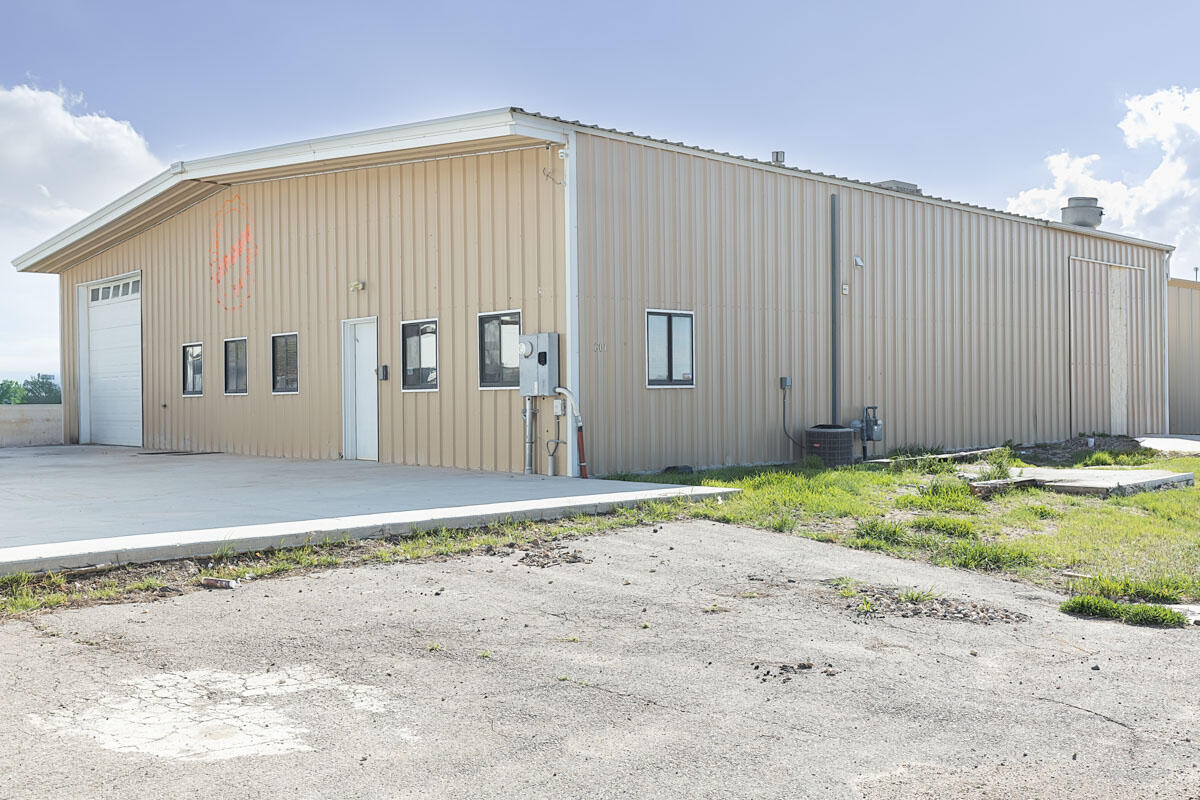 Exceptional industrial/commercial opportunity in a prime North Cedar City location just minutes from the I-15 North Interchange. This 4,000 sq ft metal building on 0.33 acres was most recently operated as an empanada production facility and is fully equipped for food manufacturing, commercial kitchen use, or specialty production.
The property features three large walk-in coolers, a commercial hood system, expansive open production areas, and a highly functional layout designed for efficient workflow. Additional improvements include approximately 800 sq ft of office and reception space, break room, restrooms, and a secondary detached structure currently set up as an additional walk-in cooler.
Equipped with 3-phase power, forced air natural gas heating, refrigerated air conditioning, a roll-up shipping door, paved access, and exterior storage, this property offers rare infrastructure for food-based operations. High visibility location with convenient access for distribution and logistics.
Ideal for owner-users or investors seeking a turnkey food production, bakery, catering, or warehouse facility.
