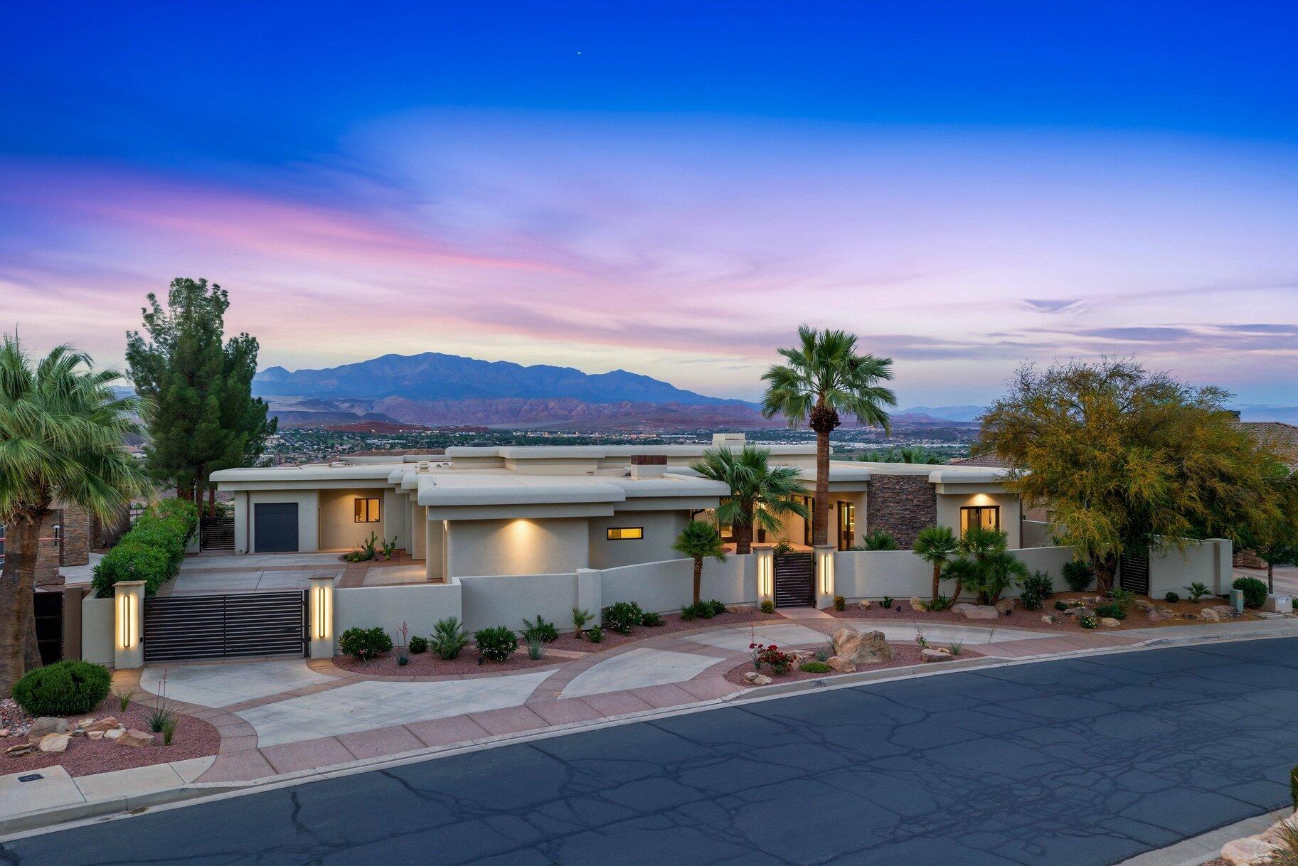 A rare opportunity to own a stunning, recently remodeled beautiful former Parade Home with unobstructed views of the Greater Saint George and Pine Valley Mountain. This absolute masterpiece of a home is perfectly designed and laid out to create a welcoming environment for you, your family, and your guests. This expansive, recently remodeled home captures the true essence of all of its original architectural design. The home's main features are 4,939 SqFt, 4 bedrooms (including the office), 3.5 bathrooms, 3.5 car garage (1,200+ SqFt), and 0.86 acres. Walk into the wide-open space of the living room, dining room, and kitchen to wind down for the day. With recent renovation work, it is truly remarkable to have been able to bring this beautiful home backs to its glory. The interior upgrades include upgraded kitchen appliances including refrigerator, dishwasher, pebble ice machine, refrigerated drawers, range hood, washer and dryer; hardwood flooring throughout, 120' Heliovision Virtual electric fireplace; complete bathroom remodels including countertops, lighting, hardware, vanity mirrors, and water softener. Exterior upgrades include a new roof, courtyard gas fireplace; air conditioning units and thermostats; outdoor kitchen with BBQ grill, new range, hood and fridge; infinity edge pool replaster with new tile, pumps, heater, and Pentair pool equipment; stucco wall painted with elastomeric paint, new landscaping, irrigation system, and 220v plug in the garage.

As one of the most desired and prestigious 24 hour guard-gated subdivisions in Saint George, Stone Cliff offers the perfect blend of privacy, community, and adventure. Centrally located and surrounded by some of our most sought-after restaurants, businesses, hospital, and wide range of amenities, there is no better feeling than being a few minutes away from your next stop. The main gathering clubhouse complex for the community boosts over 6,000 SqFt of social halls, catering kitchen, fitness center, indoor/outdoor pools/spa/splash pad, pool cabanas, outdoor seating, tennis court, pickleball courts, half basketball court, 24/7 gate with onsite security, walking/jogging trails, water fountains, and waterfall features throughout.

Situated in the city of St George in Southern Utah, the area is full of life and energy from its beautiful desert landscape, sheer mountain peaks, and area full of adventures. The home is a short drive to the majestic cliff walls of Zion National Park, the hoodoos of Bryce Canyon National Park, and the North Rim of The Grand Canyon. There is no place like it. Enjoy nearby hiking, biking, and outdoor adventures or any of the 4 amazing large reservoirs such as Sand Hollow, Quail Creek, and Gunlock, and thousands of recreational public acres for the adventurous at heart, such as the Dixie National Forrest and the breathtaking Snow Canyon State Park. The region is also known for its internationally renowned golf courses that recently hosted the PGA and LPGA tournaments and Pickleball Championships. Saint George is also the host for many events such as the Ironman, Red Bull Rampage, the Huntsman Senior Games Golf Championships, and the Saint George Marathon.