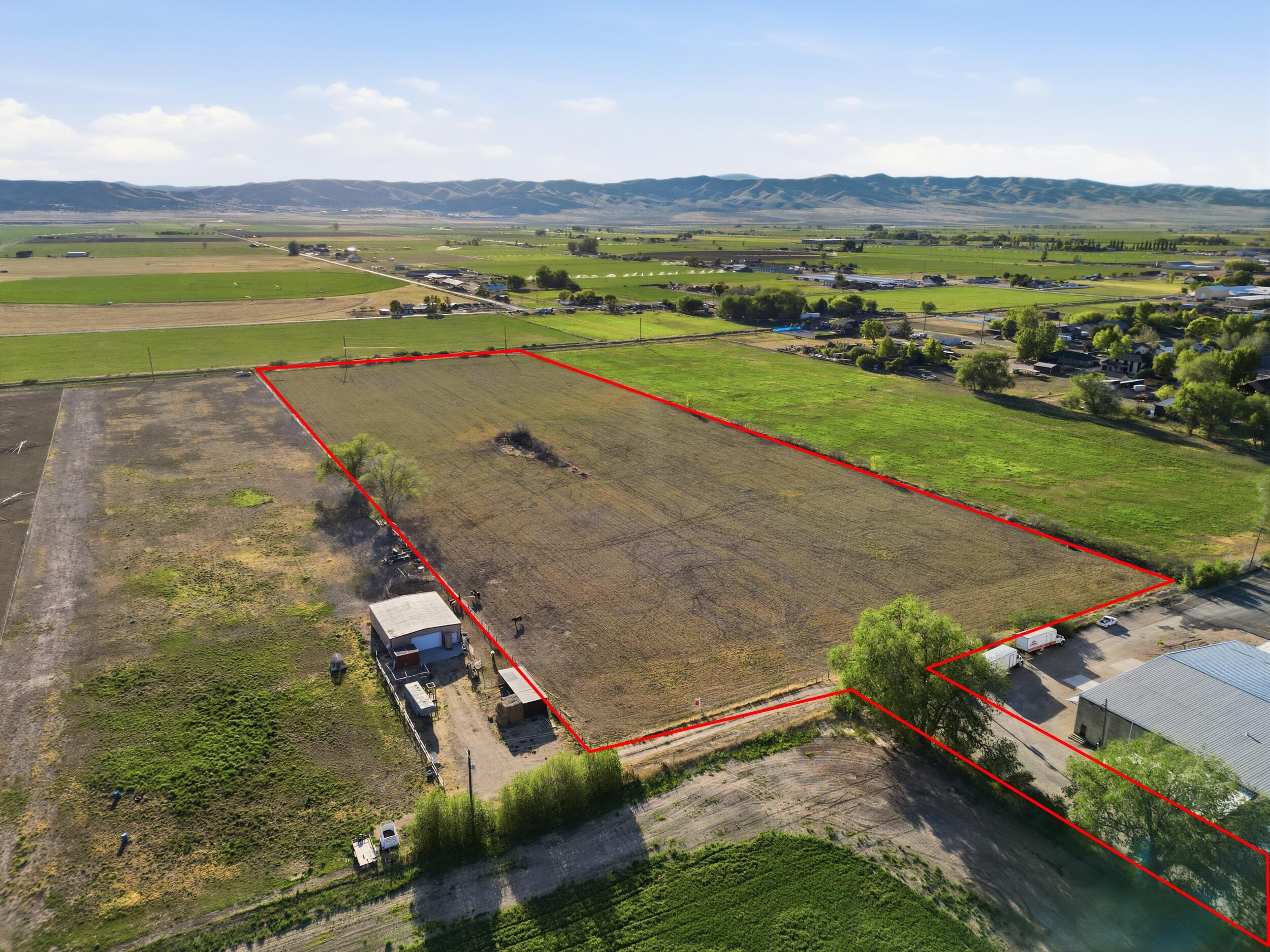 Investors and developers - this is your chance to secure 12.22 acres of fully usable land in one of Utah's fastest-growing rural markets. Located just west of Main Street with easement access, this parcel offers scale, flexibility, and long-term upside in a city experiencing 4.40% annual population growth (per appraisal: 'Nephi city... grew from 6,443 to 7,984 between 2020-2025'). The appraisal identifies the highest and best use as Residential, making this an ideal candidate for subdivision, build-to-rent, or phased development. Zoning includes CU-1 and A1-50, allowing a range of uses and potential for annexation to support higher-density residential or mixed-use concepts. The report notes the site is 'considered to have average functional utility and an average competitive rating,' giving investors a clean slate with no functional obsolescence.

Parcel 1: XB00-2388-1 = 5.9 acres = $23.80 Annual Taxes Parcel 2: XB00-2393-1 = 4.5 acres = $18.37 Annual Taxes Parcel 3: XA00-2393-21 = .65 acres = $7 Annual Taxes Parcel 4: XA00-2388-2 = .880 acres = $7 Annual Taxes Parcel 5: XA00-2393-22 = .0808 acres = $24.97 Annual Taxes Parcel 6: XA00-2475 = .160 acres = $99.90 Annual Taxes