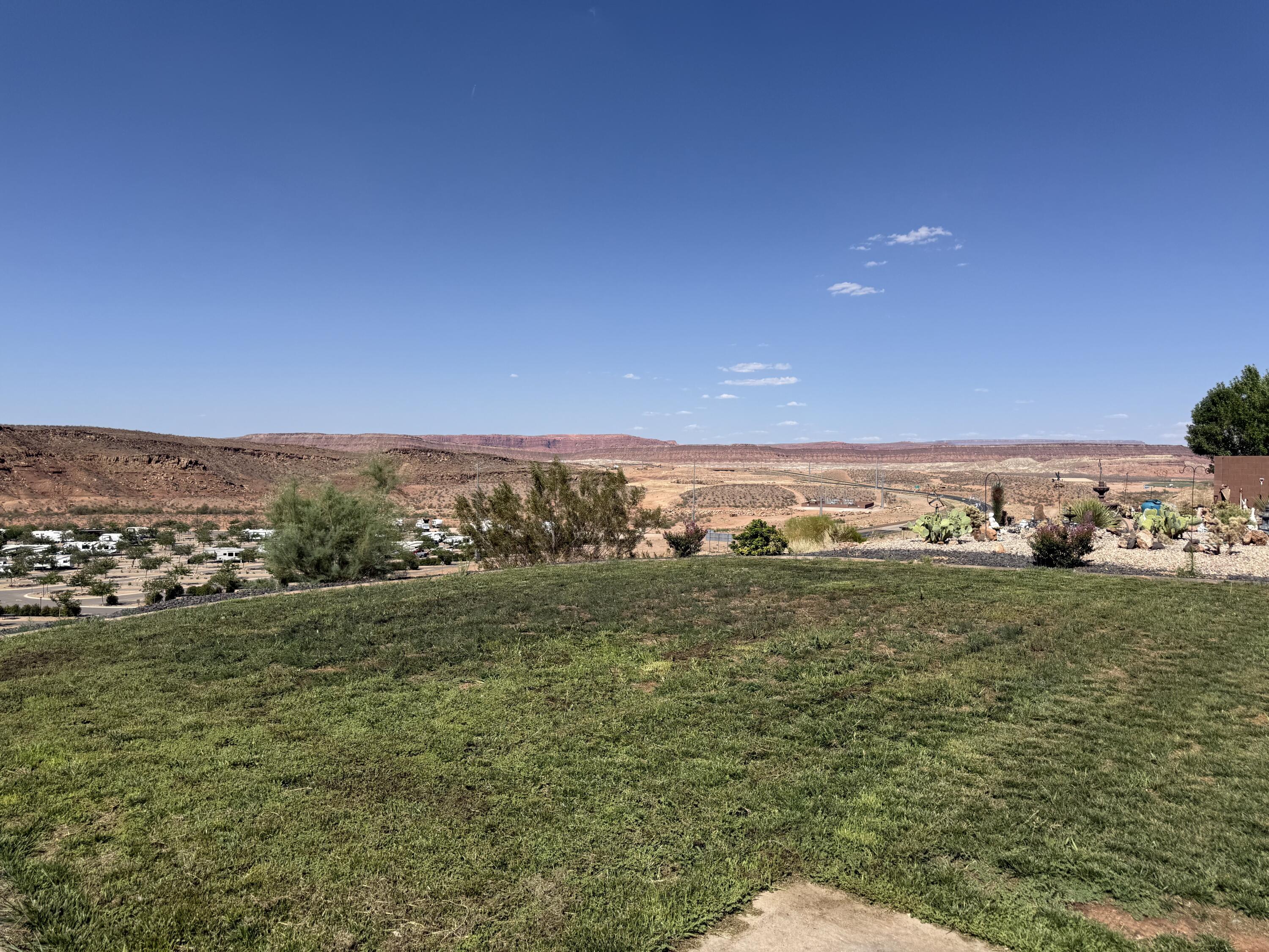 This Beautiful Home has Amazing Views, Views, and More Views.  Great location in Desert Canyon Subdivision with Dixie Power. 4 bedrooms and 2 bathrooms.  RV parking for all your toys. No HOA. Seller will pay $3500 for LANDSCAPING with a FULL PRICE OFFER.