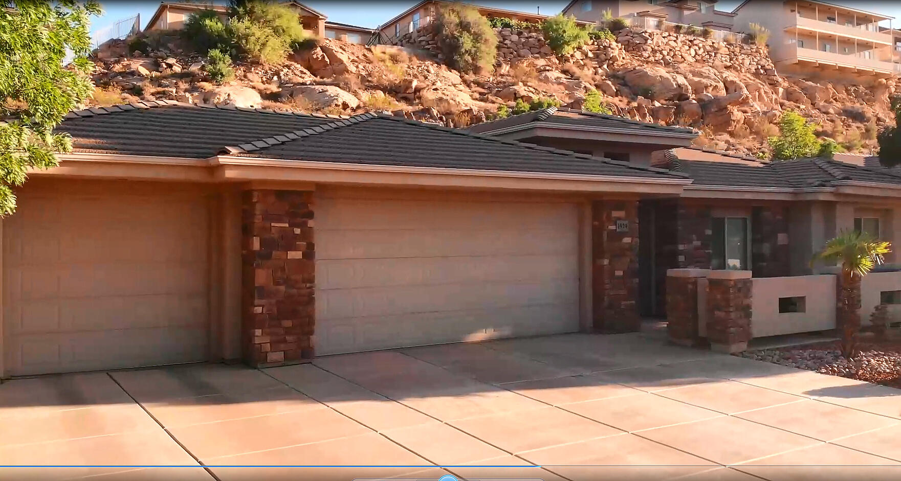 This beautifully maintained 3-bedroom, 2-bath home offers 1,954 sq. ft. of comfortable living on a .24-acre lot surrounded by Southern Utah's stunning red rock scenery. Featuring rich wood cabinetry, granite countertops, stainless steel appliances, plantation shutters, and a spacious open floor plan, this home blends quality craftsmanship with everyday comfort.
The generous primary suite includes a dual-sink vanity, soaking tub, and plenty of space to unwind. A floor-to-ceiling stone fireplace anchors the inviting living room, while large windows fill the home with natural light and views of the beautifully landscaped yard. Complete with a 3-car garage and a peaceful setting, this move-in-ready home is the perfect combination of comfort, style, and location.