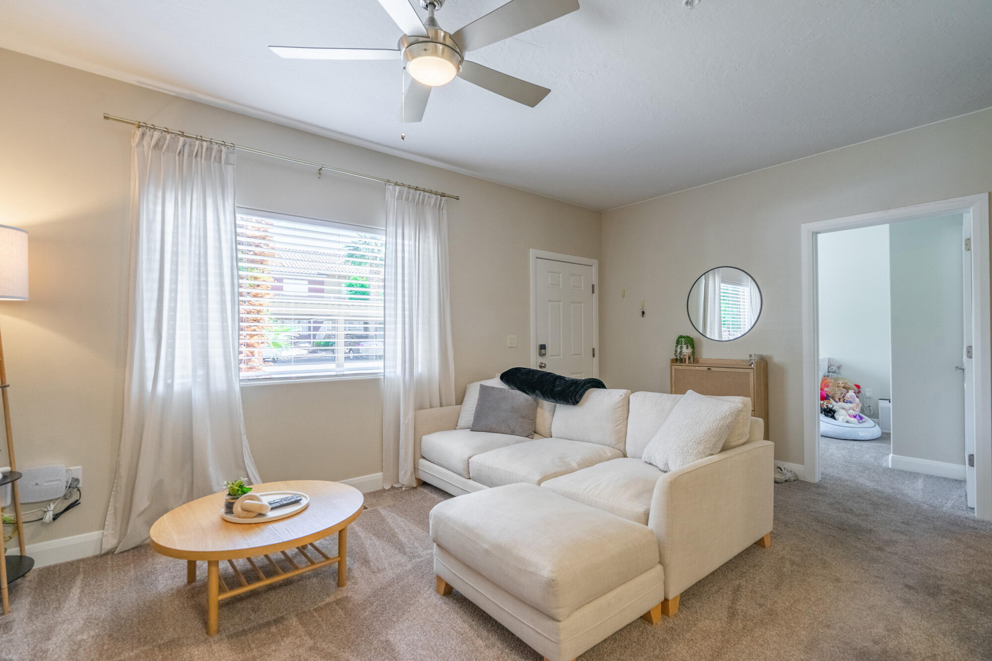 Recently remodeled lower-level condo in desirable Washington City location! Convenient access to I-15, shopping, dining, and nearby walking/biking trails. Move-in ready with updated finishes and low-maintenance living. HOA covers water, sewer, garbage, exterior building insurance, exterior maintenance, roof, and full yard care--helping reduce monthly expenses. Community amenities include clubhouse, outdoor pool, and hot tub. Ideal starter home, second home, or investment property with strong rental potential.