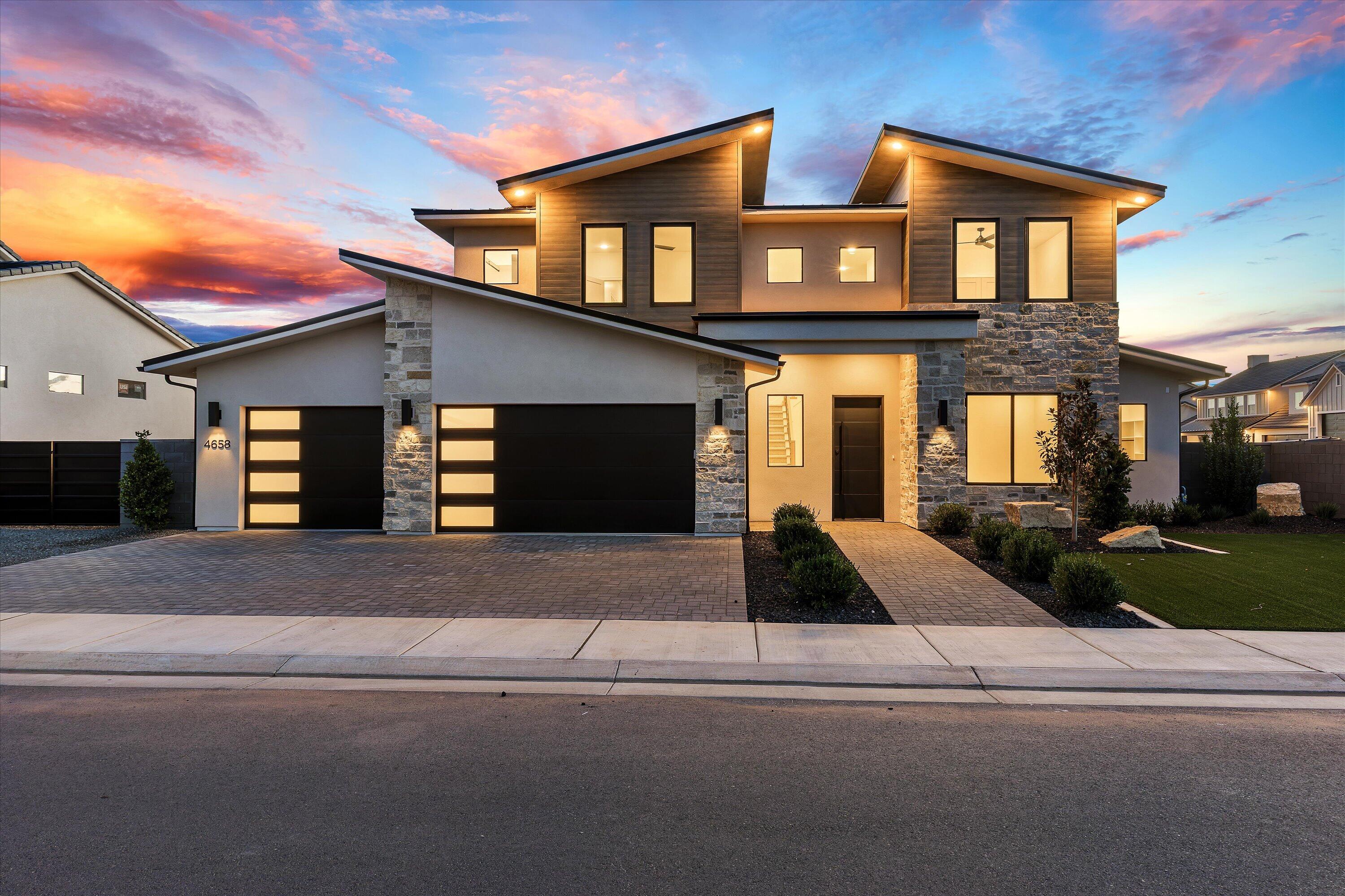 This stunning home features a pool, hot tub,  and trampoline all on a fully landscaped, fenced lot. Just blocks from Crimson Cliffs High & Middle School. Inside, discover engineered wood floors, custom cabinetry, and a gourmet kitchen with drop-in cooktop, vented range hood, floor-to-ceiling cabinets, and quartz countertops. Additional features include a mudroom with locker cabinets, gas fireplace with built-in wall unit, spacious laundry with sink and storage, and walk-in pantry. The primary suite offers a freestanding tub, makeup vanity, tiled walk-in shower, and oversized closet with built-in drawers. An additional bedroom and full bath on the main level provides perfect accommodations for guests. All information deemed reliable but not guaranteed; buyer to verify all.