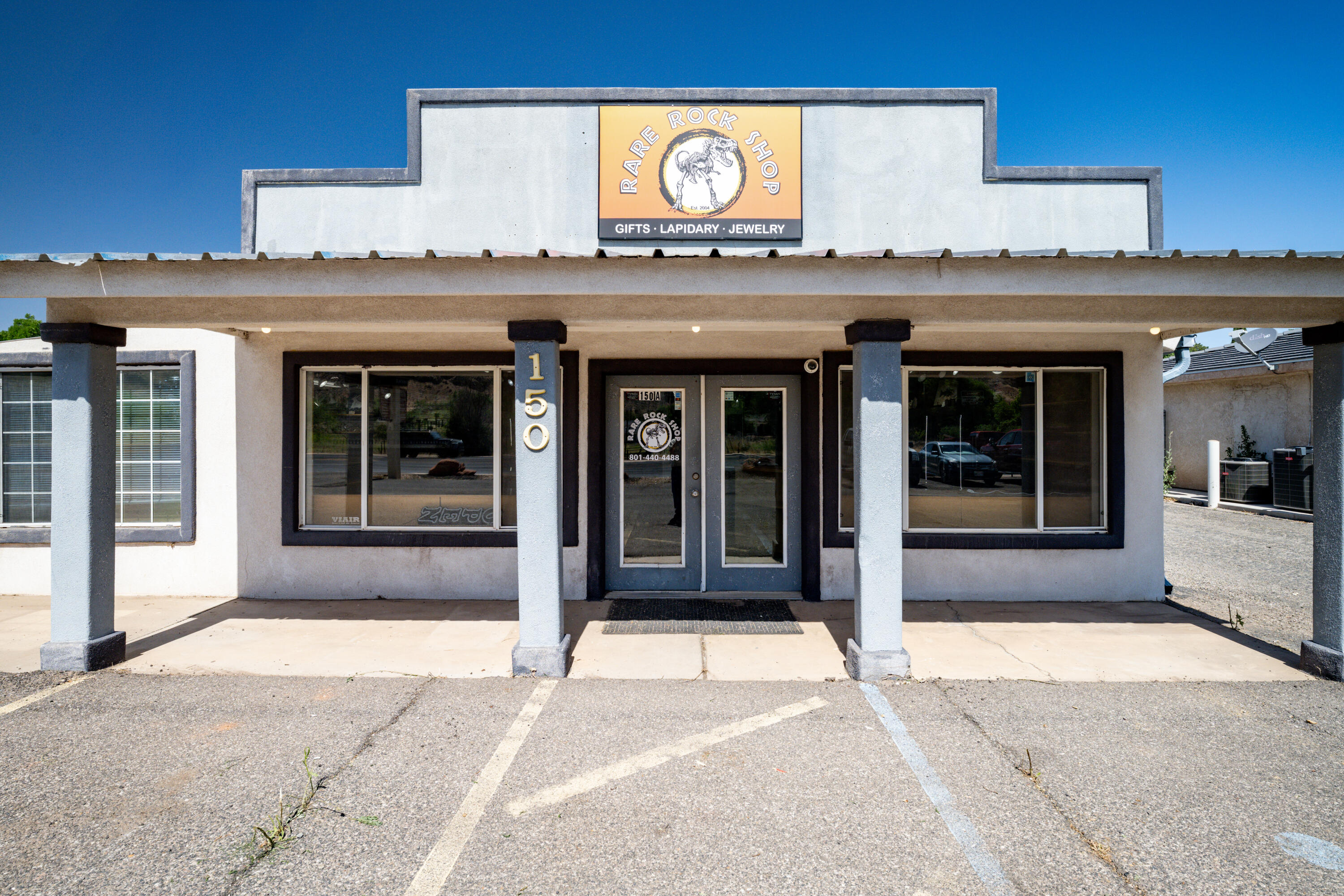 Prime commercial opportunity with exceptional highway exposure. 

This versatile 4,212-square-foot building sits directly on a high-traffic state highway, offering maximum visibility and immediate accessibility for your business. 

High-Visibility Location: Premium state highway frontage with an included dedicated signpost for maximum brand exposure. Beautiful newly remodeled showroom for retail with lighted cabinets and great access to private patio. Security camera system throughout. Hard wood flooring and solid wood cabinetry. 

Flexible Vehicle Bays: Four spacious garage doors opening into three drive-in bays. 

Varied Ceiling Heights: One bay boasts a 14-foot clearance for heavy equipment or large vehicles. Two additional bays feature 10-foot ceilings.

Functional Layout: Seamlessly combines expansive warehouse storage space with a dedicated professional office and an on-site bathroom. 

Multi-Use Zoning: Ideal for automotive, light manufacturing, contracting, retail distribution, or flex-space conversion. 

Bring your business to the next level in a location that drives customers straight to your door. Schedule your private tour today!