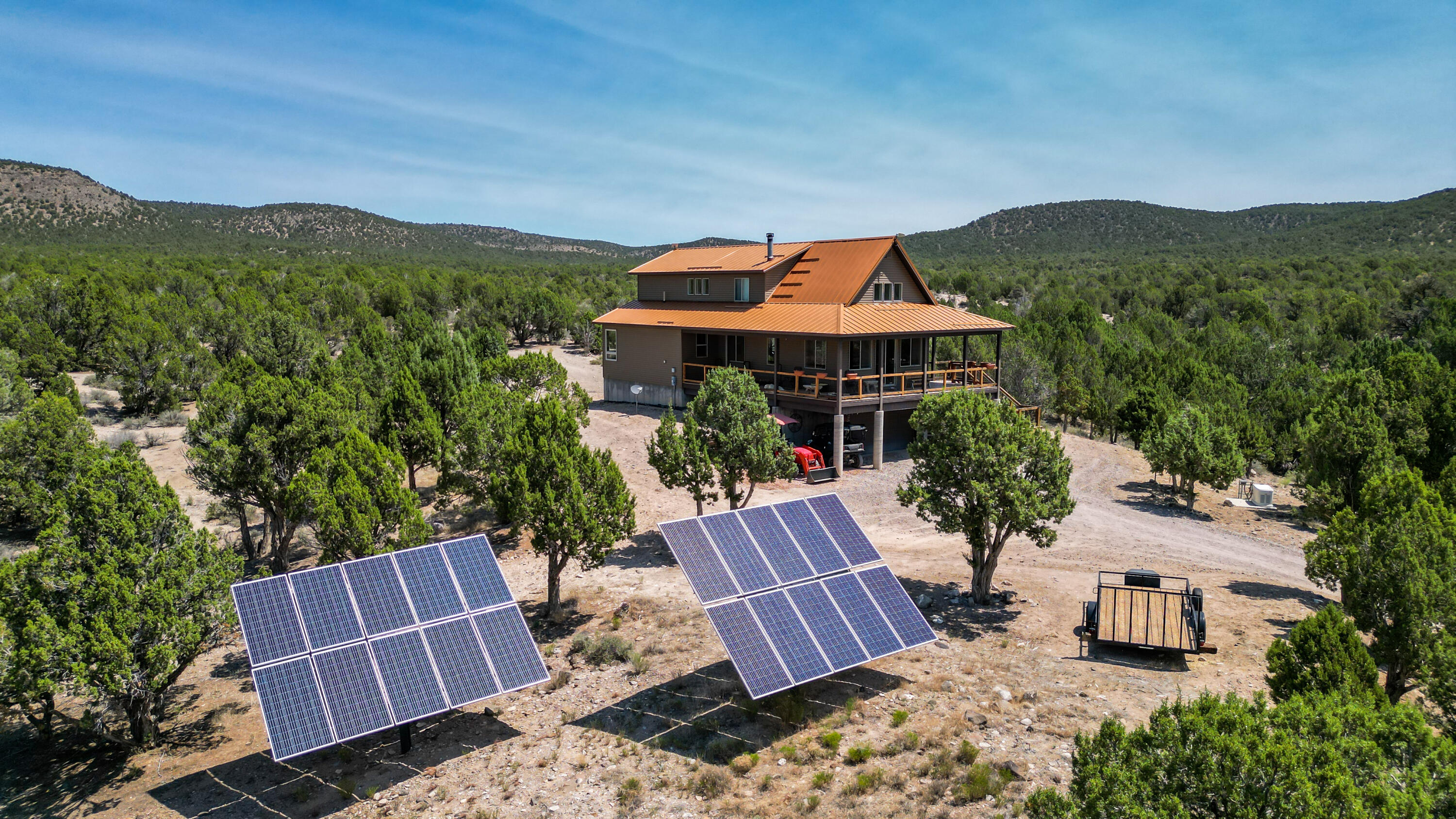 WELCOME HOME TO SOUTHERN UTAH! If you're dreaming of your own private slice of heaven, this extraordinary 40-acre
furnished estate delivers. Nestled against both BLM and Forest Service land, it offers unrivaled off grid seclusion, panoramic
mountain views, and a true sense of freedom-it's as if you own all of the mountains. Crafted with care and quality, the custom-
built home features high-end finishes throughout and was designed to take full advantage of its breathtaking surroundings. Step
out onto the expansive wraparound deck to soak in the scenery, or explore the impressive 3-car tandem garage with
ADDITIONAL ATV pull-in storage beneath. Equestrian lovers and outdoor enthusiasts will be thrilled by the well maintained
horse pasture(s), stalls, and round pen and direct access to endless trails for riding, hiking, and biking. From your backyard, you
can hunt for mountain lions, deer, elk, and more-this is a true sportsman's paradise. Where sustainability meets luxury, this
SOUTH FACING property boasts a fully owned, state-of-the-art solar power system with automatic controls to a whole home
generator for peace of mind, a whole-home water filtering system, private spring-fed well for exceptionally pure water. Located
just 8 miles from town and 5 miles from Enterprise Reservoir-ideal for kayaking, boating, and fishing-and only an hour from St.
George or Cedar City. Zion National Park is a scenic 2-hour drive away, making this the perfect balance of seclusion and
accessibility. Whether you're entertaining guests, building a homestead, or simply escaping the noise of city life, this one-of-a-
kind mountain retreat offers the lifestyle you've been searching for. Buyer and Buyer's Agent to verify all information, including
square footage and acreage, to their satisfaction.
VIEW VIRTUAL TOUR HERE -https://my.matterport.com/show/?m=Bp1kRdDe3NL