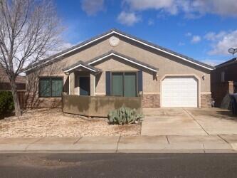 This one just won't wait long.  Why?  This home is a 2 bedroom 2 bathroom open floor plan that is nestled in a quiet neighborhood in La Verkin, UT.  Move-in ready!  Less than 30 minutes to Zion National Park to the east and less than 30 minutes to St. George to the west.  A perfect starter home, rental property,  vacation or retirement home. Enjoy energy efficient windows and doors.  Sometimes, ''less is more''!  In this case it is much much more.  This1100 square feet of interior shows immaculate care and attractiveness.
This home is where affordability, efficiency and simplicity all come together!  NO HOA. Walk thru and see if it checks the box's for you.