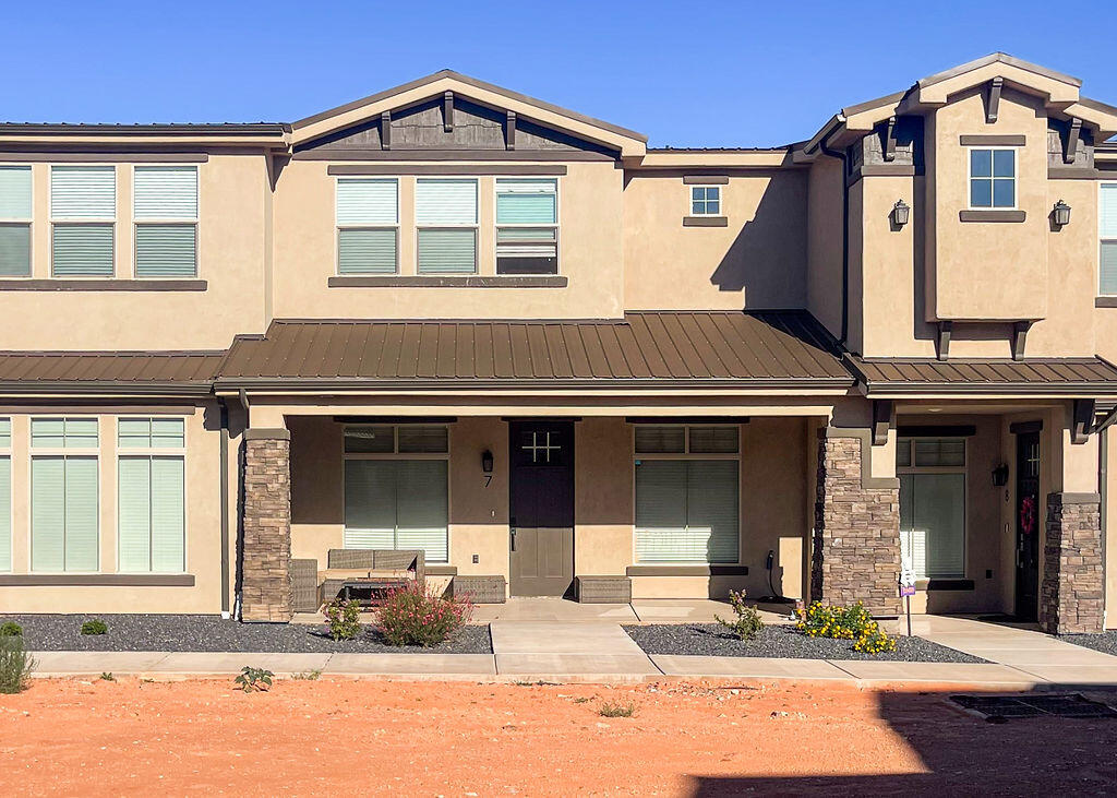 100% Financing Available + $5,000 Lender Credit from Seller!
This beautifully upgraded town home, completed in June 2022, feels like new and offers modern finishes throughout and a welcoming covered front entry patio and elevated curb appeal.
This home shines with premium upgrades including: granite countertops and a stylish tile backsplash, convenient under-cabinet kitchen lighting Stainless steel appliances Tall 8-foot doors and impressive high ceilings that create a bright, spacious feel and trendy sliding barn door on the laundry room. Upstairs you'll find a versatile bonus room perfect for a home office, playroom, or guest space. The wide garage provides excellent storage and parking, and a community swimming pool is coming soon--perfect for enjoying those Southern Utah summers!
Don't miss this rare opportunity--100% financing is available through the USDA Rural Housing Loan Program, and the seller is generously offering a $5,000 lender credit to help make your move even easier. Home must be primary residence and buyer to qualify with 80% AMI lending criteria.  
Information deemed reliable. Buyer to verify all details, including utilities, rental restrictions, HOA rules, and any deed restrictions.