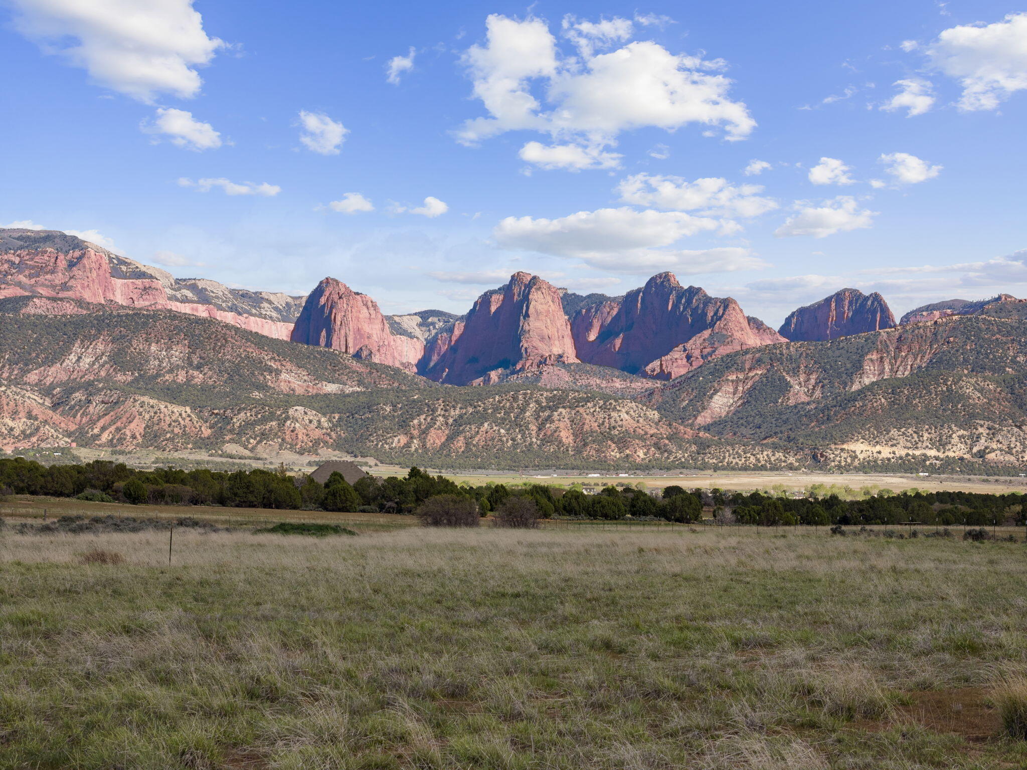 Tucked into one of Southern Utah's most stunning valleys, this rare 6-lot subdivision offers spacious parcels ranging from 5 to 6 acres each—perfectly positioned to take in breathtaking views of both Kolob Canyon and Pine Valley Mountain. Whether you're looking to build your dream home or invest in a piece of this peaceful paradise, these lots offer the perfect blend of space, beauty, and convenience.
Each lot is gently nestled into the landscape, offering a serene, private feel while still being part of a thoughtfully designed neighborhood. The setting is truly one-of-a-kind—surrounded by wide-open skies, incredible sunsets, and mountain backdrops in every direction.
Utilities are already in the street, making your build process easier and more affordable.  Taxes to be determined