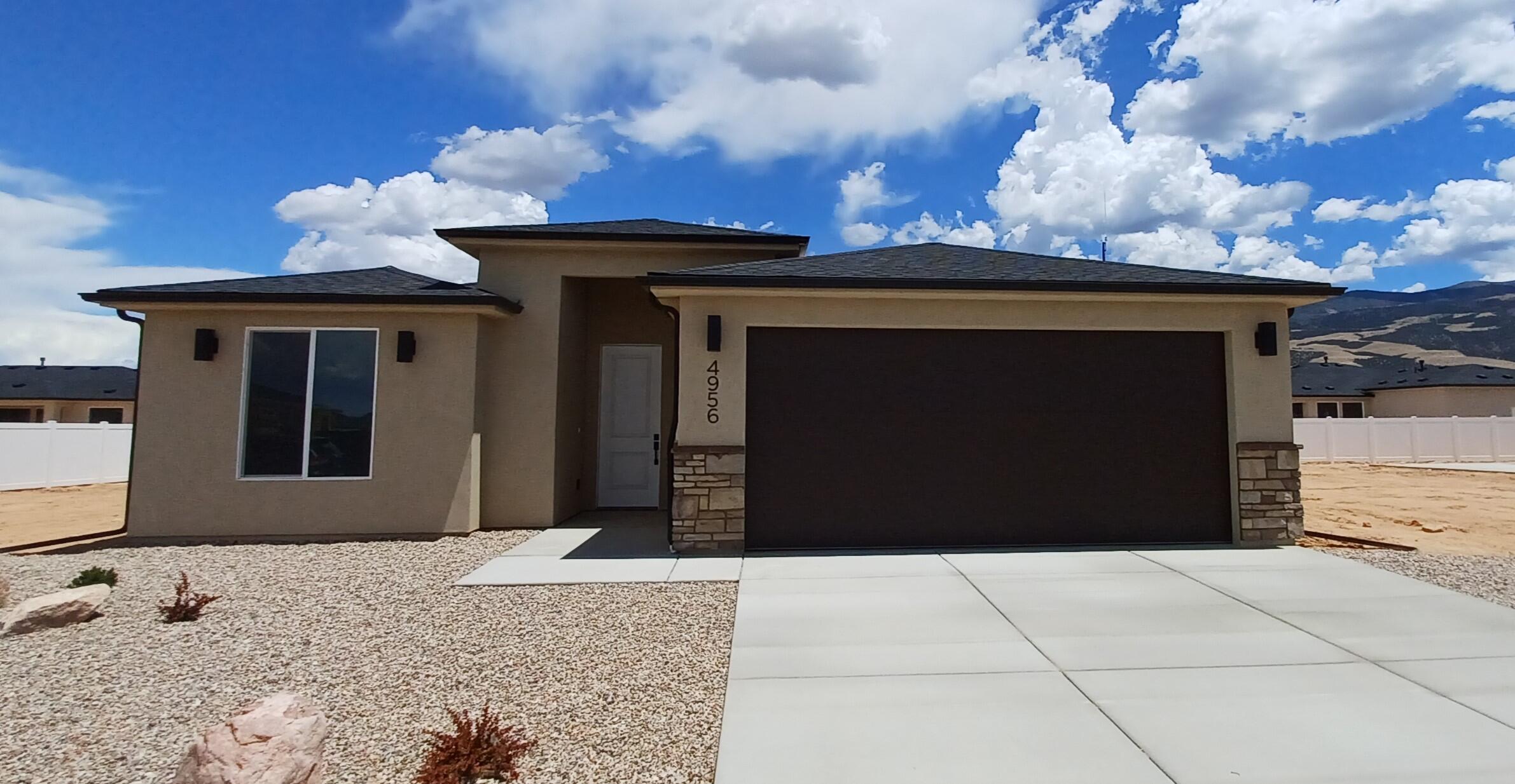 Welcome to The Ammond, a brand-new single-level home in the growing Valley Gate Estates community. Offering 1,530 sq. ft., this thoughtfully designed floor plan features 3 bedrooms, 2 bathrooms, and a spacious 3-car garage. The open-concept layout creates seamless flow between the kitchen, dining, and living areas, providing both functionality and comfort. The private primary suite includes a walk-in closet and ensuite bathroom for added convenience. Quality craftsmanship and modern design make this move-in-ready home an excellent opportunity. Front landscaping, backyard fencing, and refrigerator are included, adding value and convenience to this new construction home. Ask about our preferred lender incentives.