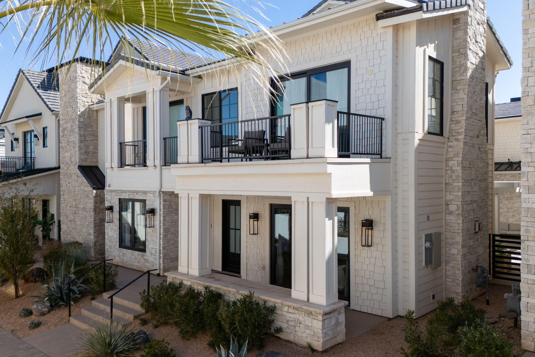 Stunning luxury vacation home in Desert Color Resort offering the ultimate St. George getaway and investment opportunity. This expansive 8 -bedroom, 7 full + 2 half bath property comfortably sleeps up to 32 guests and is designed for both high-end living and unforgettable group experiences. Located just steps away from the 2.5-acre lagoon with sandy beaches, this home delivers true resort-style living in one of Southern Utah's most sought-after communities.

Inside, you'll find a thoughtfully designed layout across three levels featuring a private home theater, spacious gathering areas, and a fully equipped kitchen ideal for entertaining. The home is loaded with amenities including arcade games, ping pong, shuffleboard, and multiple indoor/outdoor living spaces that make it perfect for hosting large groups or maximizing nightly rental potential.

Step outside to your own private oasis with a pool, hot tub, covered patio, BBQ area, and a third-level rooftop deck complete with fire table and ample seating--perfect for enjoying Southern Utah sunsets.

Desert Color Resort offers unmatched amenities including a lagoon for swimming, paddleboarding, and kayaking, resort-style pools and hot tubs (heated year-round), pickleball courts, and a vibrant community atmosphere with ongoing events such as food truck nights, live entertainment, and family activities.

Additional features include a 2-car garage, ample nearby parking, and access to boat/RV/trailer parking within the community. Whether you're looking for a luxury second home, a high-performing nightly rental, or a property that offers both lifestyle and income, this home checks every box.

Buyer to verify all information.