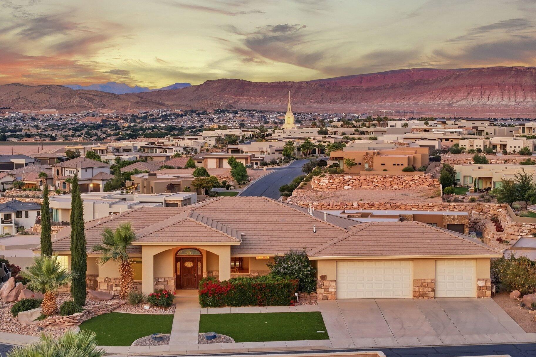 Welcome to one of Southern Utah's most coveted addresses. Nestled in the prestigious gated community of Stone Cliff, this lovingly maintained home has been cared for by its original owners since it was custom-built in 2000 -- and it shows. Solid, well-kept, and full of potential, this is a rare opportunity for a buyer ready to put their own personal stamp on a Stone Cliff property. With 3,926 square feet of total living space, the home offers a generous and flexible floor plan. The main level (2,197 sq ft) features a spacious primary bedroom suite, a dedicated office, and 2 baths.  

The living room and kitchen are perfectly oriented to capture the breathtaking panoramic views that Stone Cliff is famous for, with the stunning Southern Utah landscape as your constant backdrop.

The walk-out basement (1,729 sq ft) is a standout feature -- bright and airy with abundant natural light that feels anything but below grade. Two additional bedrooms are located here, including a private guest suite with its own full bathroom, making it ideal for multigenerational living, extended guests, or a potential mother-in-law arrangement.

This is your chance to acquire a well-priced home in one of St. George's most exclusive neighborhoods and customize it exactly to your taste -- all while enjoying 24/7 gated security, resort-style community amenities including indoor and outdoor pools, fitness center, and clubhouse, plus those unforgettable Stone Cliff views. Home is on a double lot and is priced to reflect its original condition. The bones are excellent -- the vision is yours.