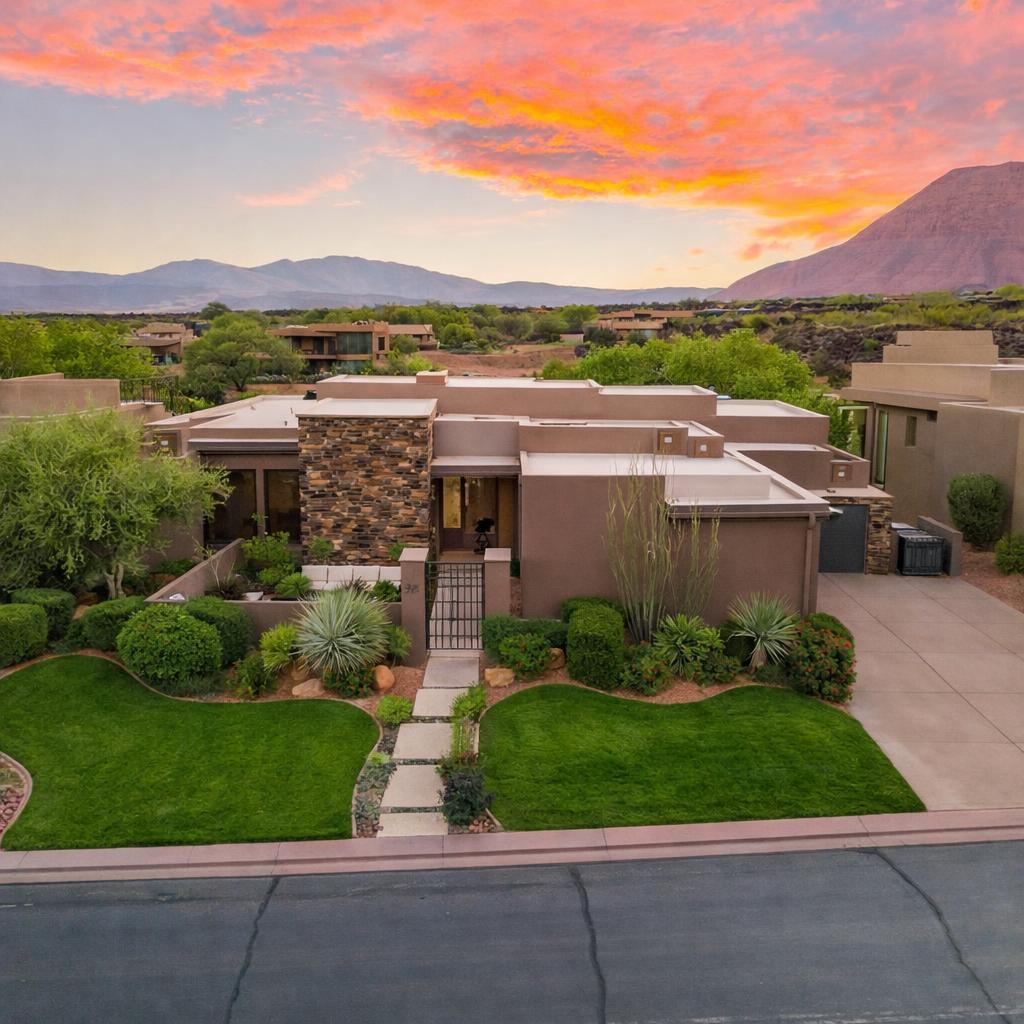 Nestled within the coveted Cliffs of Snow Canyon community, well maintained residence reflects a rare standard of craftsmanship. Every detail was chosen with intention -- from the custom imported Indonesian Ironwood and Teak beams to the hand-hewn carvings, stair rails, closet doors, and finish work that grace both the interior and exterior. Thoughtfully designed for low-maintenance living without sacrificing luxury, the home's open, livable spaces are appointed with top-of-the-line fittings throughout. Offers privacy & views of Snow Canyon and Red Mountain unfold from every window, making this a home where everyday life feels extraordinary. Low monthly HOA fees and optional access to all the amenities at Entrada. Turn Key (some art & items to be excluded, washer & dryer negotiable).