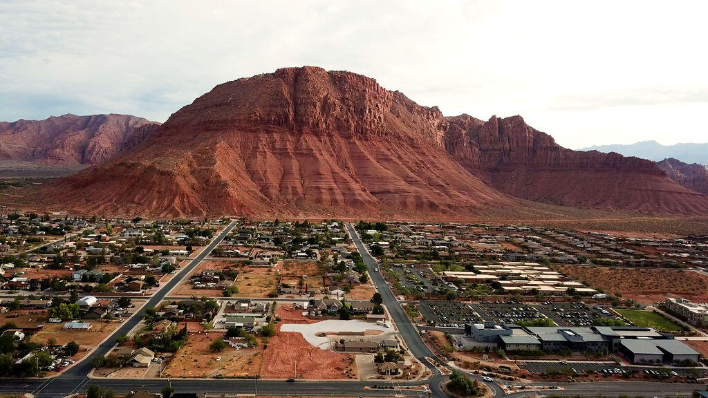 An exceptional ground lease opportunity is now available in the heart of rapidly growing Ivins, Utah. This premier 1.80± acre commercial development site consists of two commercially zoned parcels (I-41-B and I-41-A-1) strategically positioned on a highly visible corner at a major roundabout, offering outstanding frontage, convenient access, and exceptional exposure to daily traffic. Surrounded by expanding residential neighborhoods and located within one of Southern Utah's fastest-growing trade areas, the property presents an outstanding opportunity for developers, investors, and businesses seeking a premier location. Flexible ground lease terms and build-to-suit opportunities are available, making the site well suited for a variety of commercial uses, including restaurants, coffee shops, medical and professional offices, financial institutions, retail centers, boutique grocery, pharmacy, urgent care, fitness studios, day spas, and other specialty retail or mixed commercial developments, subject to City approval. Utilities are available (buyer/tenant to verify). Serving the growing communities of Ivins, Kayenta, and the greater St. George area, this highly desirable location offers excellent demographics, strong visibility, and long-term growth potential. Call for pricing and additional leasing information. Listing information deemed reliable but not guaranteed; buyer to verify all information.