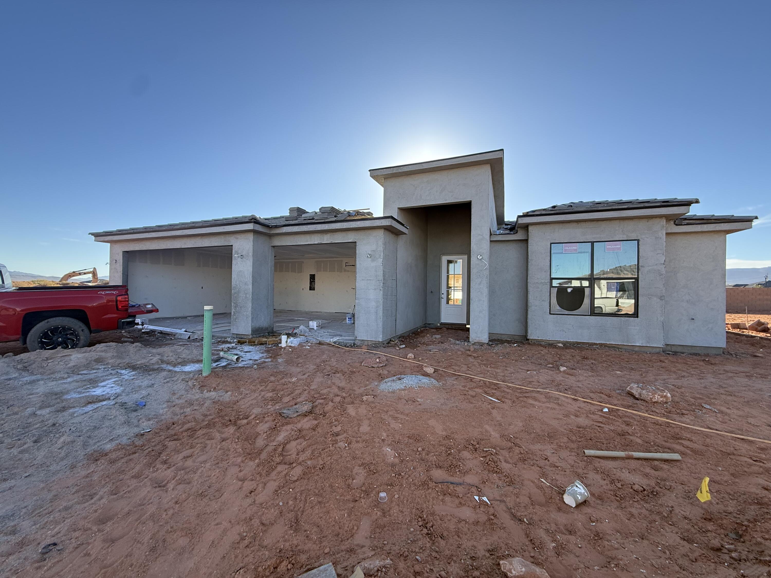 Welcome to the Skyview floorplan, offering 2,331 sq ft of thoughtfully designed living space with 4 bedrooms, 3 bathrooms, and a 3-car garage. This stunning home impresses from the moment you enter, featuring extra-tall ceilings in the entry and living room that create a light-filled, open atmosphere. Elevated finishes are found throughout, including 8' interior doors, upgraded carpet and pad, and cabinetry in the laundry room for added function and style. The spacious layout is ideal for both everyday living and entertaining, with generous living areas and well-appointed bedrooms. Retreat to the spa-like primary suite featuring a stunning freestanding tub and upscale finishes.
