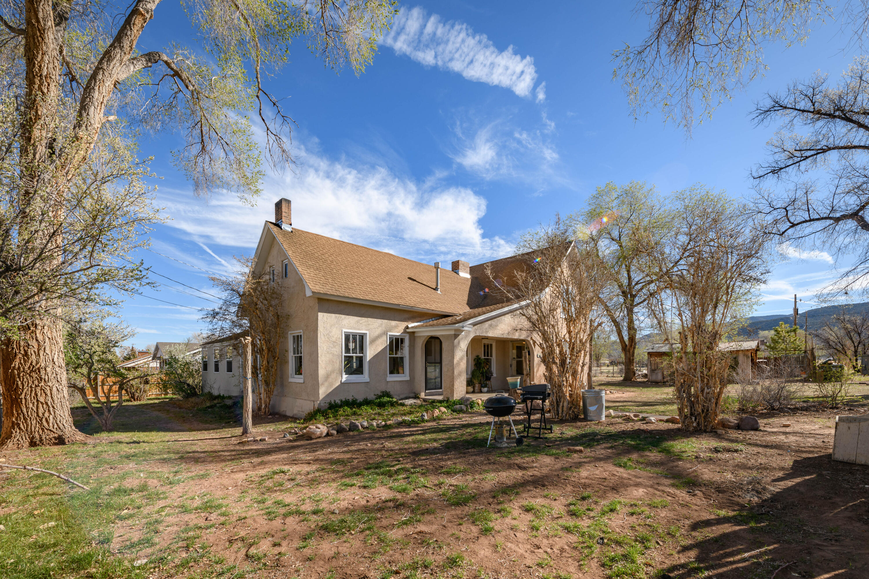 Charming 1914 home in the quaint and quiet town of Parowan. It has lots of charm and character that you can appreciate. It offers a unique Kitchen, Dining Room and Living Room with a wood stove for those snowy winter evenings. Wooden floors, large pantry, built in bookshelves, and china cabinet and much more. Large trees in front and fruit orchard in the back along with pressurized irrigation. Seller is leaving 2 window AC units and a swamp cooler. New Furnance installed March 2026. Roof 10 years old.