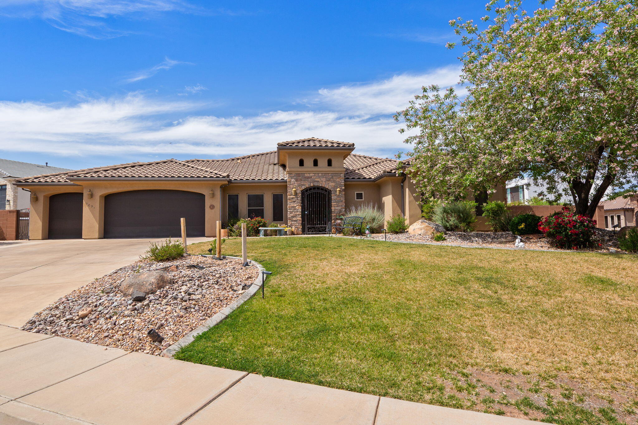 Superb High-end home located on Foremaster Ridge. Upgrades include travertine, wood floors, granite counters,3 tone paint and much more! Open kitchen and living room that provides a perfect space for socializing.  Built-in cabinets & three-tone paint add style and functionality.  Oversized three car garage with a storage room available. This home effortlessly blends style, space and practicality, making it ideal for those who love to entertain!  Close to downtown St. George, Red Cliffs Mall and all local destinations.