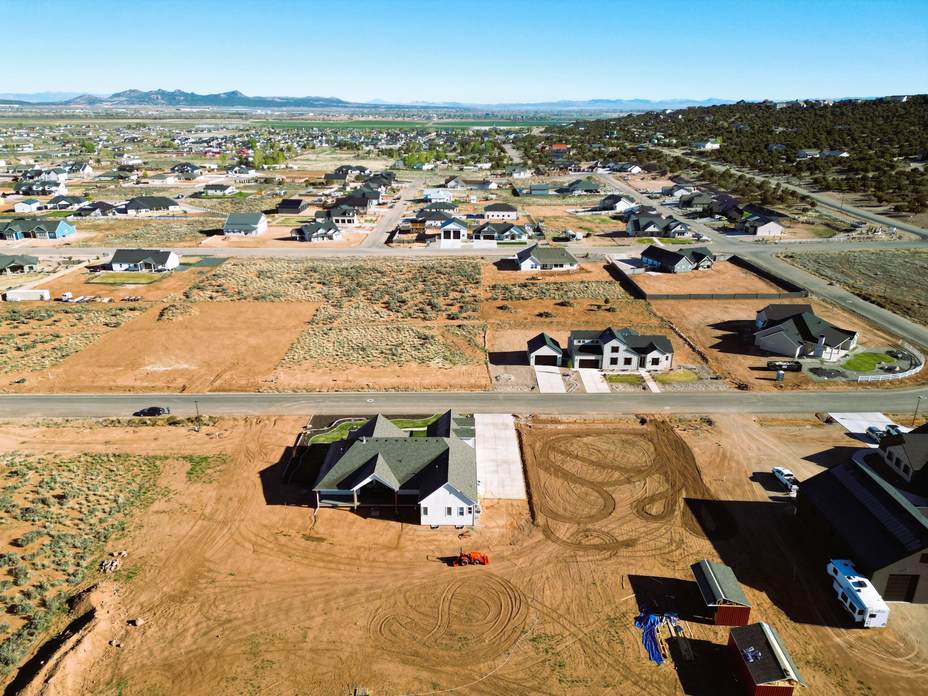 Build your dream home on this spacious .88-acre lot in 4B Ranch! You'll love the open setting, beautiful views, and the freedom of country-style living with city convenience. This property offers animal rights, bring-your-own-builder flexibility, and valuable prep work already completed, including a survey and site plan available upon request. Utilities are available, making this an excellent opportunity to move forward with your custom home plans in one of Cedar City's desirable large-lot subdivisions less than ten minutes from all that Cedar City has to offer.