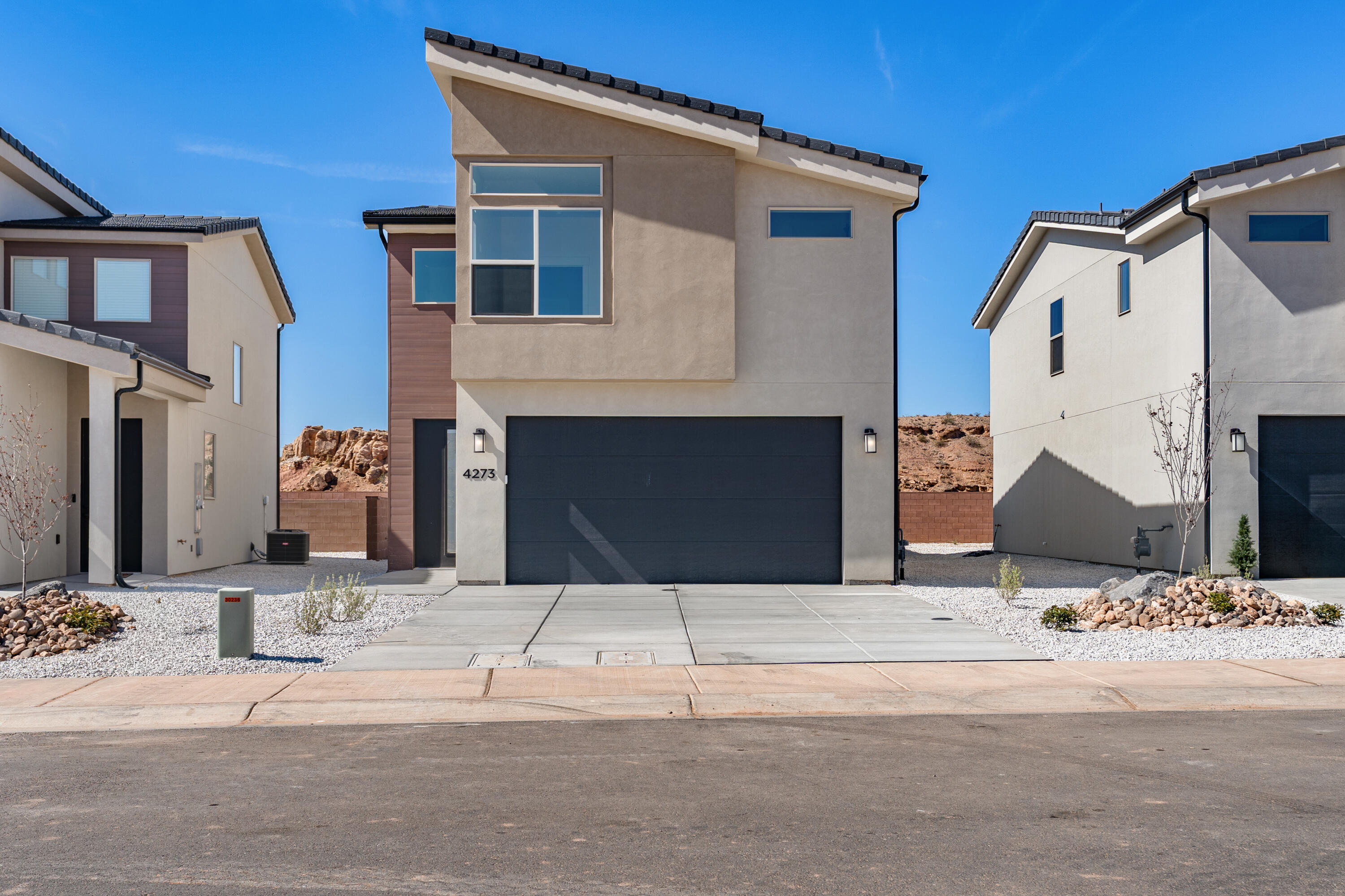 4 bed 2.5 bath home with a 2-car garage in the brand-new Desert Reflection community by Salisbury Homes. Features include EVP flooring in main living areas and bathrooms, upgraded carpet in bedrooms, quartz countertops throughout, stainless steel gas appliances (fridge not included), modern cabinets, and kitchen backsplash. Community park, trails, and amenities nearby. NOTE: Interior and exterior finishes are predetermined and may change. Photos are examples of the finishes are also subject to change. Buyer/agent to verify all info.