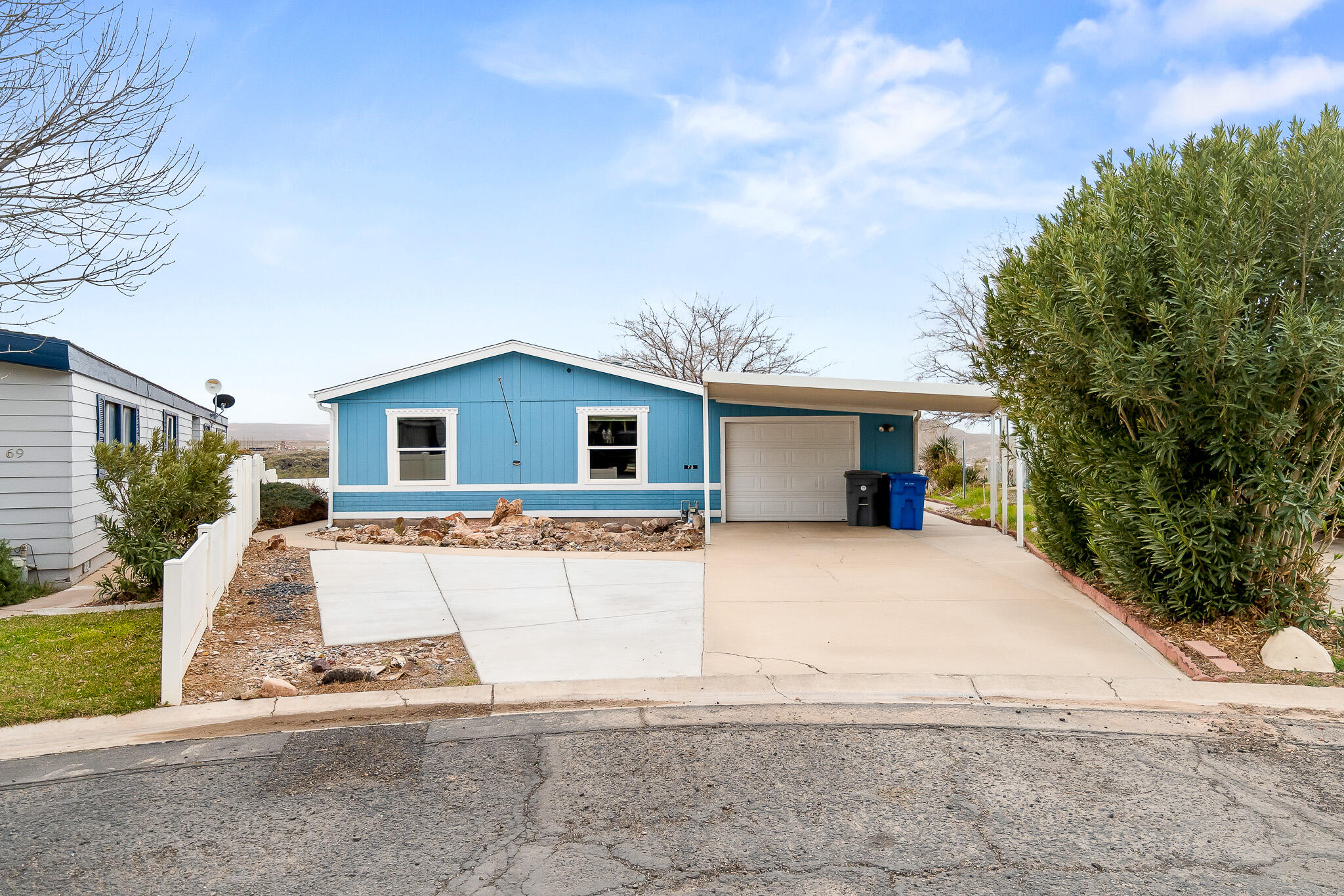 Welcome to your peaceful retreat in Lava Bluff Mobile Homes in beautiful Hurricane! Located in a desirable 55+ community, this 3-bedroom, 2-bathroom home offers comfort, space, and breathtaking scenery.

Situated on a spacious .15-acre lot, the property provides room to relax, garden, entertain, or simply enjoy the surrounding landscape. You'll be captivated by the incredible panoramic views in every direction -- the perfect backdrop for both quiet mornings and colorful desert sunsets.

Inside, the home features a functional and inviting layout with three generously sized bedrooms and two full bathrooms. The enclosed porch is a standout feature -- an ideal space to take in the views year-round while enjoying your morning coffee or winding down in the evening.

If you're seeking a peaceful, active adult lifestyle with space and spectacular surroundings, this Hurricane gem offers the perfect blend of comfort and scenery. Come experience the views and welcoming community for yourself!