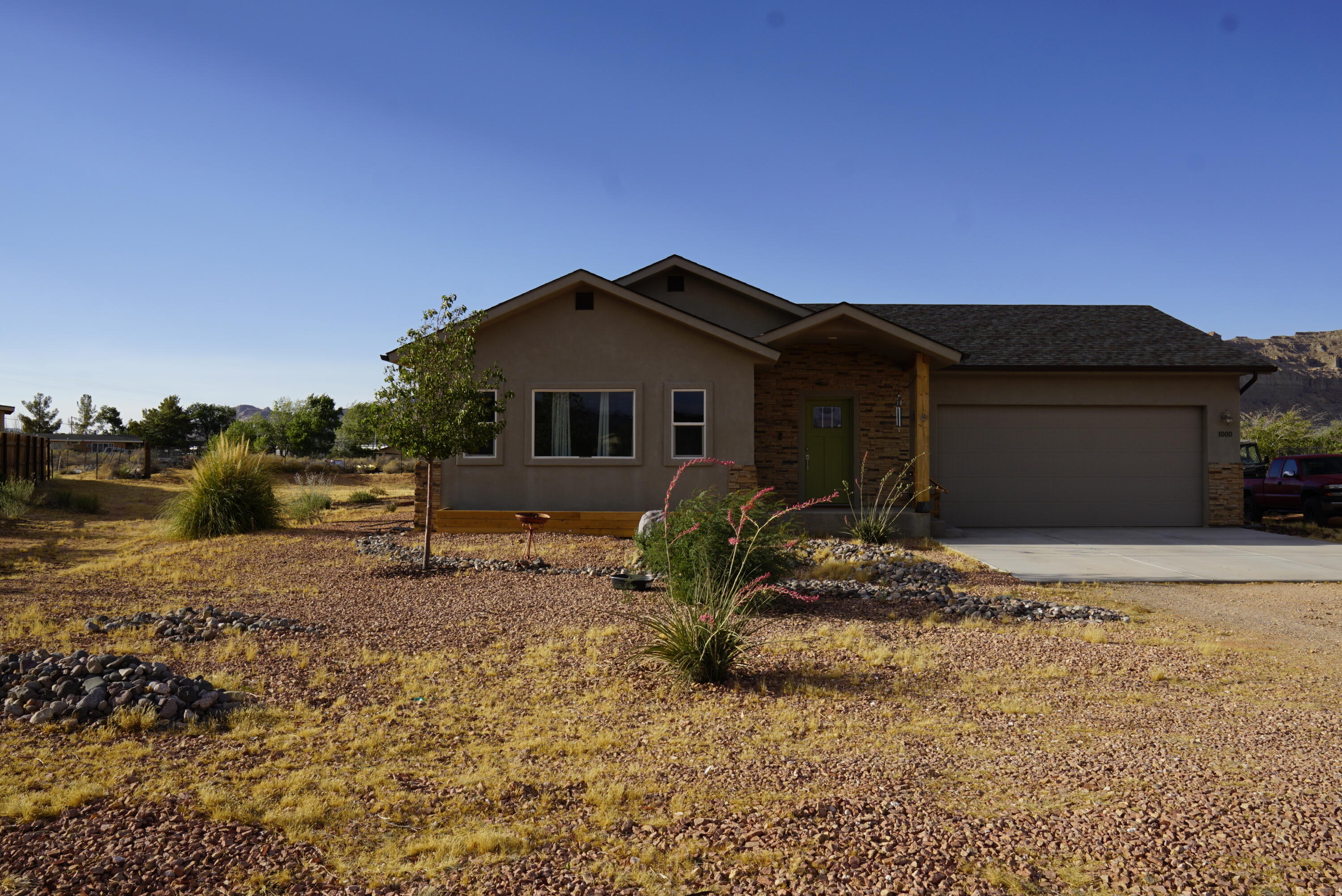Nice Lake Powell property available now!  VA assumable, this lightly lived in home comes with extended living space for the new spa and covered patio area. This may be your chance to create your S. Utah dreamy getaway spot!
The home is in great condition with 3 bedrooms, 2 baths, and a spacious family room/den area.  Fully electric, with water softener system, vinyl flooring and good size living area space.  
Located at the back of the cul-de-sac, the lot  is .55 acre, allowing plenty of room for a detached RV garage and/or an accessory dwelling for added income. 
 
Enjoy ownership in this newer neighborhood, minutes from Lake Powell Marinas and surrounded by the raw beauty of the Desert.  Amangari Resort and Glen Canyon Dam are several minutes down the road.  Many destination locations all being a same day drive from Big Water. Looking for a place central for hiking, boating, and overall outdoor adventure?   

Seller is providing a one year Home Warranty and when asked what they have enjoyed most about living here, they said it is very peaceful, stress free, great neighbors, the sunsets and the stars!