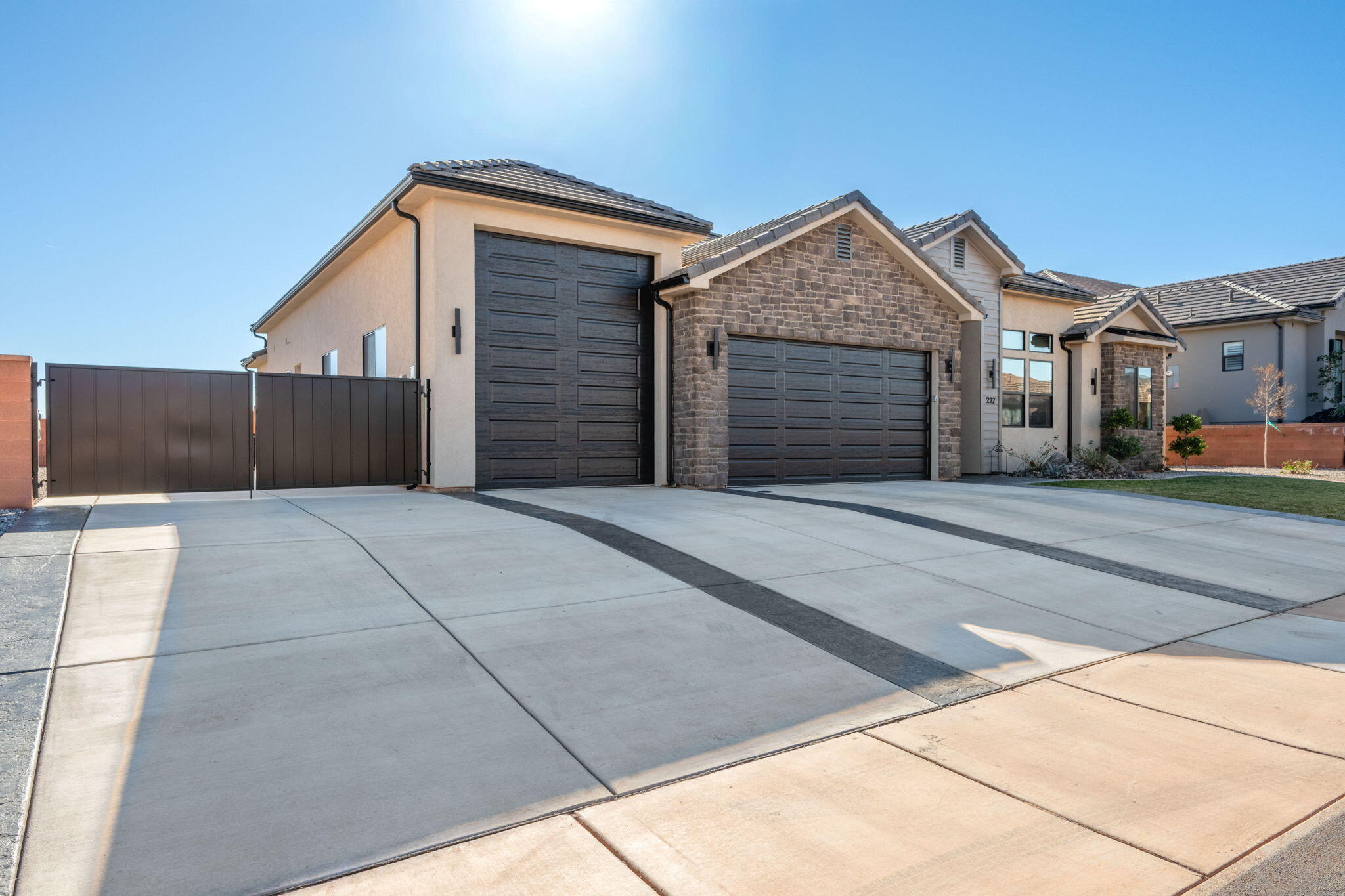 Bring Every RV, Boat, and Toy You Own -- This Ivins Home Has Room for All of It.

If you've been hunting Southern Utah for a home that can actually handle your RVs and toys, this is the one. A double-wide RV pad behind an iron gate holds two full-size RVs side by side. 

A 36-foot covered RV garage takes whatever else you've collected -- boat, trailer, side-by-sides. And the deep bay of the 3-car garage sits right next to existing plumbing, making it the easiest casita conversion on the market: guest suite, rental income, or home office. The value is already built in.

Then you step inside, and it more than keeps up.

The kitchen earns the word 'dream.' Knotty alder and white-painted cabinetry, Vanilla Quartz countertops, and GE Café appliances set the tone, while a true butler's pantry -- its own sink, its own full run of counter -- does the real work. Not a closet with shelves. A second kitchen.

The rest of the home matches: whole-home audio, automated shades, custom closet systems, built-in shelving, and full water filtration, with finished details in every room. Quiet, comfortable, and move-in ready from day one.

All of it set in Ivins directly across from Unity Park, minutes from Snow Canyon, Tuacahn, and Kayenta. Tuacahn Amphitheatre, Kayenta Art Village, and Gunlock Reservoir.