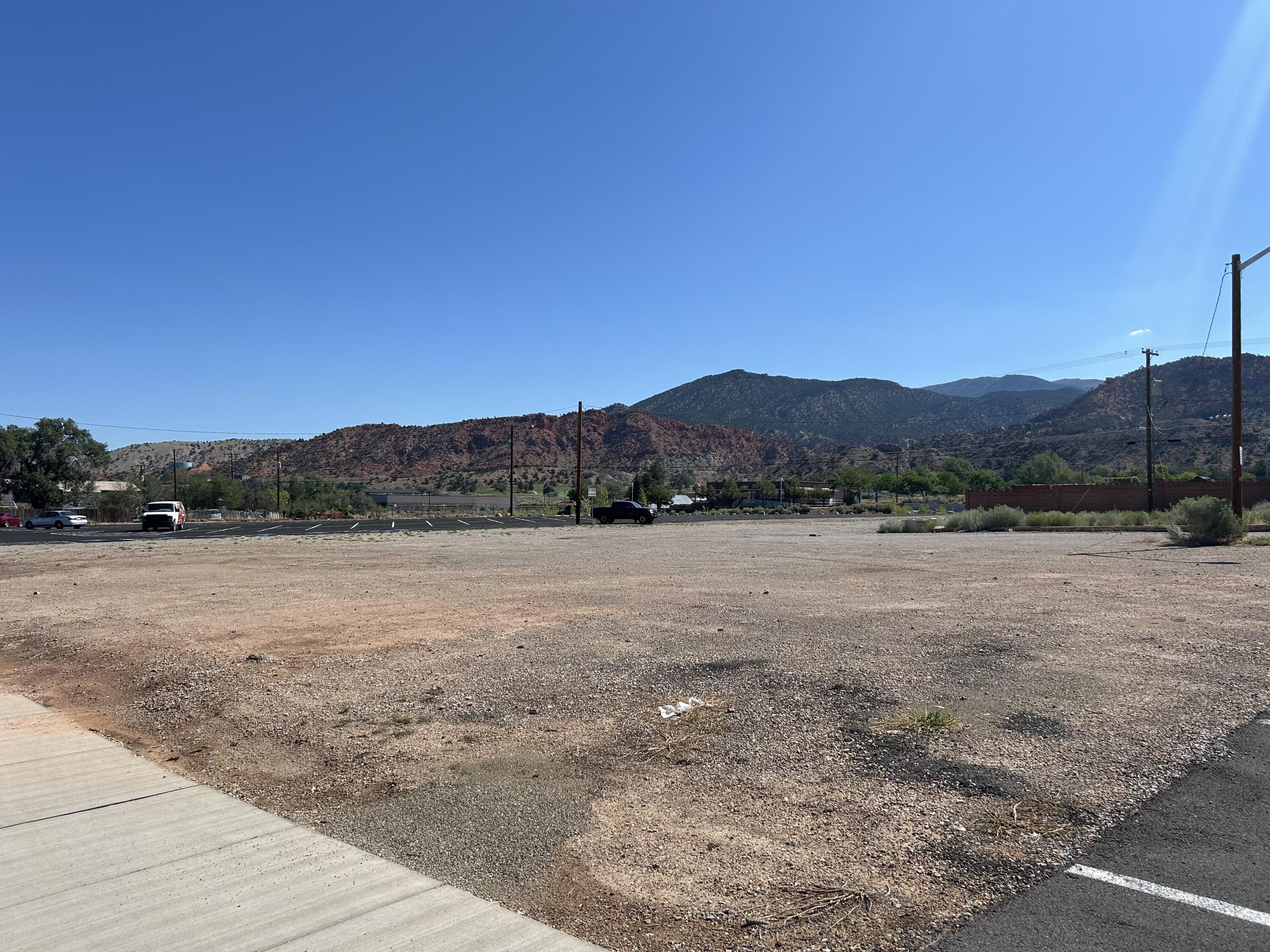 INVESTOR/DEVERLOPER ALERT! This is a rare, one of a kind property that is an investor/developer's dream with potentially fitting up to 24 units! Located in the middle of Cedar City, across from the City Park and City Library, the location doesn't get any better than this! Right in the middle of everything that Cedar City has to offer, the property is located less than a block away from Cedar City's historic downtown Main Street. With the zoning of R3-M, the possibilities are nearly endless for what could be done with the development of this parcel. All of the utilities are either stubbed to the property or are close by. The city recently built the parking lot to the north of this property. Don't delay, come see today!
