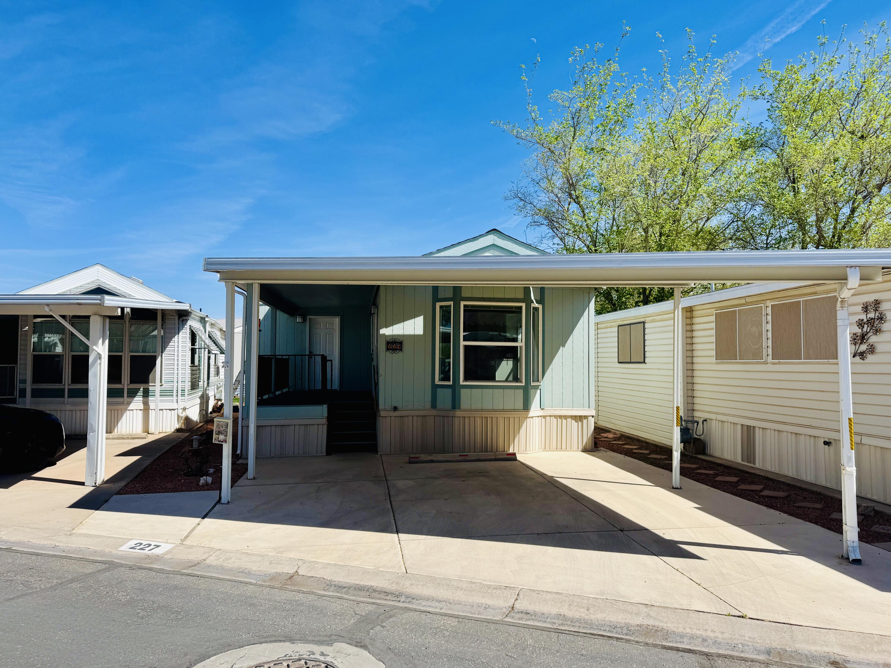 BRAND NEW ROOF, NEW INTERIOR PAINT, and FINANCIABLE.  This Charming 2 bedroom, 2 bath home is move-in ready. It features newer flooring, appliances, and countertops,. Recent upgrades include a new 40-gallon water heater and disposal (March 2025), a new microwave (2 years ago), HVAC system replacement ($9,000, 2.5 years ago). The home has an abundance of natural light from many windows.  Enjoy the spacious backyard with a large shed and a serene, park-like setting with mature trees and lush grass. Don't miss this beautifully maintained home! Buyer to verify all information.