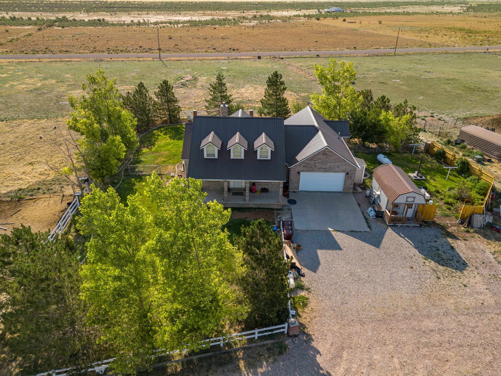 Rare opportunity on 8+ acres in Cedar City! This 5 bed, 4 bath, 3,428 sq ft home includes 2 water shares, a vegetable-producing garden, and space for goats, a bull, horse, chickens, turkeys, and more. A large barn offers storage or livestock shelter. The property is fenced with an additional fully fenced yard behind the home. Perfect for homesteading or hobby farming with stunning views and room to grow—all just minutes from town!