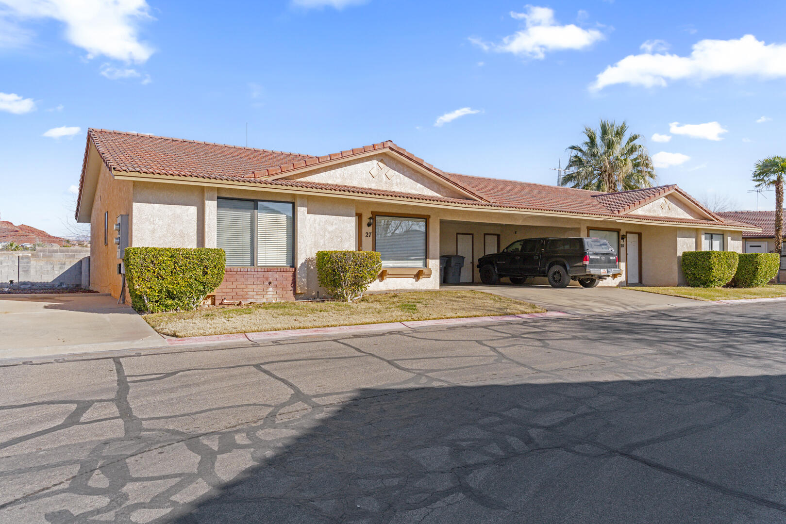 Beautiful Southern Utah Views + Affordability with this well-maintained 3-bedroom, 2-bath, 1039 SQ. FT. townhouse. Tucked away in a quiet St. George neighborhood. Enjoy private mountain views from the backyard patio while backing up to a church parking lot for added privacy and no neighbors behind! Features include a carport with storage closet, fresh paint, clean carpet, new toilets, and a new refrigerator. Low HOA provides a pool and well-kept common areas. Perfect for a first home, vacation property, investment, or anyone seeking affordability in Southern Utah. Conveniently located near stores, parks, trails, Snow Canyon, and all the amenities St. George has to offer. Listed under $300,000 at $298,000 you are going to want to see this one!