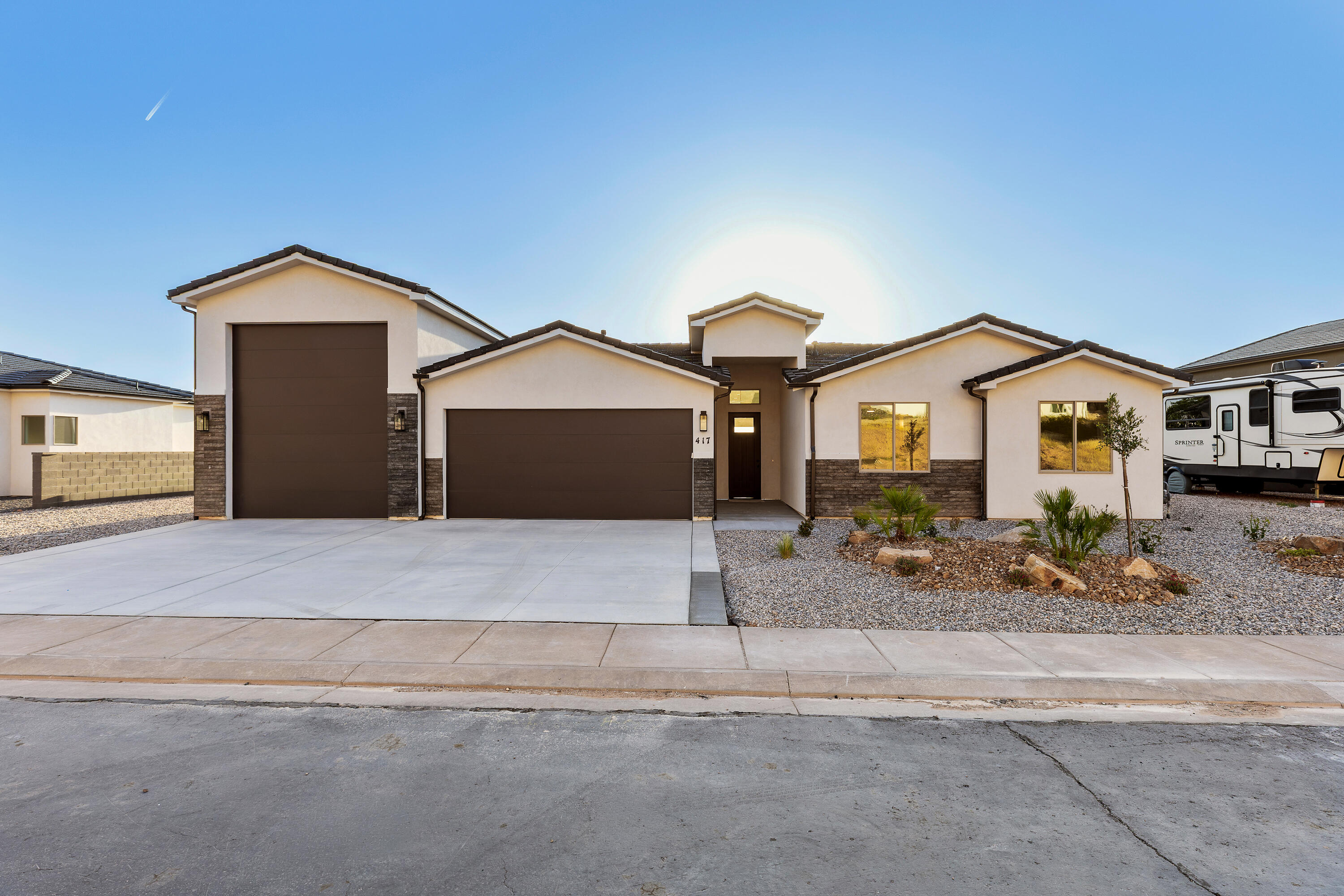 Modern design, open layout, and plenty of room for storage, toys, or adventure-ready living. The RV Garage features a 12' wide door with 14' of height with the depth a little over 48'. The kitchen features quality wood cabinets, quartz countertops, and black plumbing fixtures. The large island is perfect for entertaining. The primary suite offers a walk-in closet and unobstructed view of Pine Valley Mountain. Enjoy the convenience of single-level living with stylish touches and ample storage for everything you need. Contract the listing agent to schedule your showing today.
1% Builder Closing Cost Credit! Rates Starting at 4.875% (5-Year ARM) When You Finance with Our Preferred Lender!