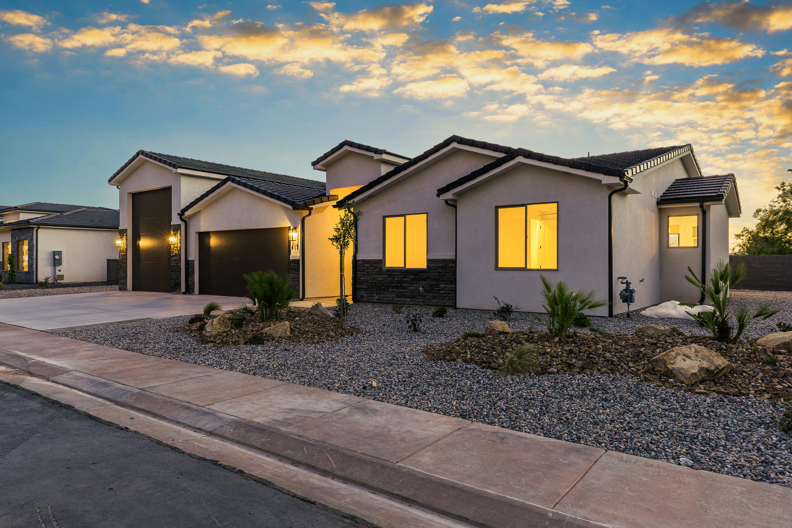 Modern design, open layout, and plenty of room for storage, toys, or adventure-ready living. The RV Garage features a 12' wide door with 14' of height with the depth a little over 48'. The kitchen features quality wood cabinets, quartz countertops, and black plumbing fixtures. The large island is perfect for entertaining. The primary suite offers a walk-in closet and unobstructed view of Pine Valley Mountain. Enjoy the convenience of single-level living with stylish touches and ample storage for everything you need. Contract the listing agent to schedule your showing today.
1% Builder Closing Cost Credit! Rates Starting at 4.875% (5-Year ARM) When You Finance with Our Preferred Lender!