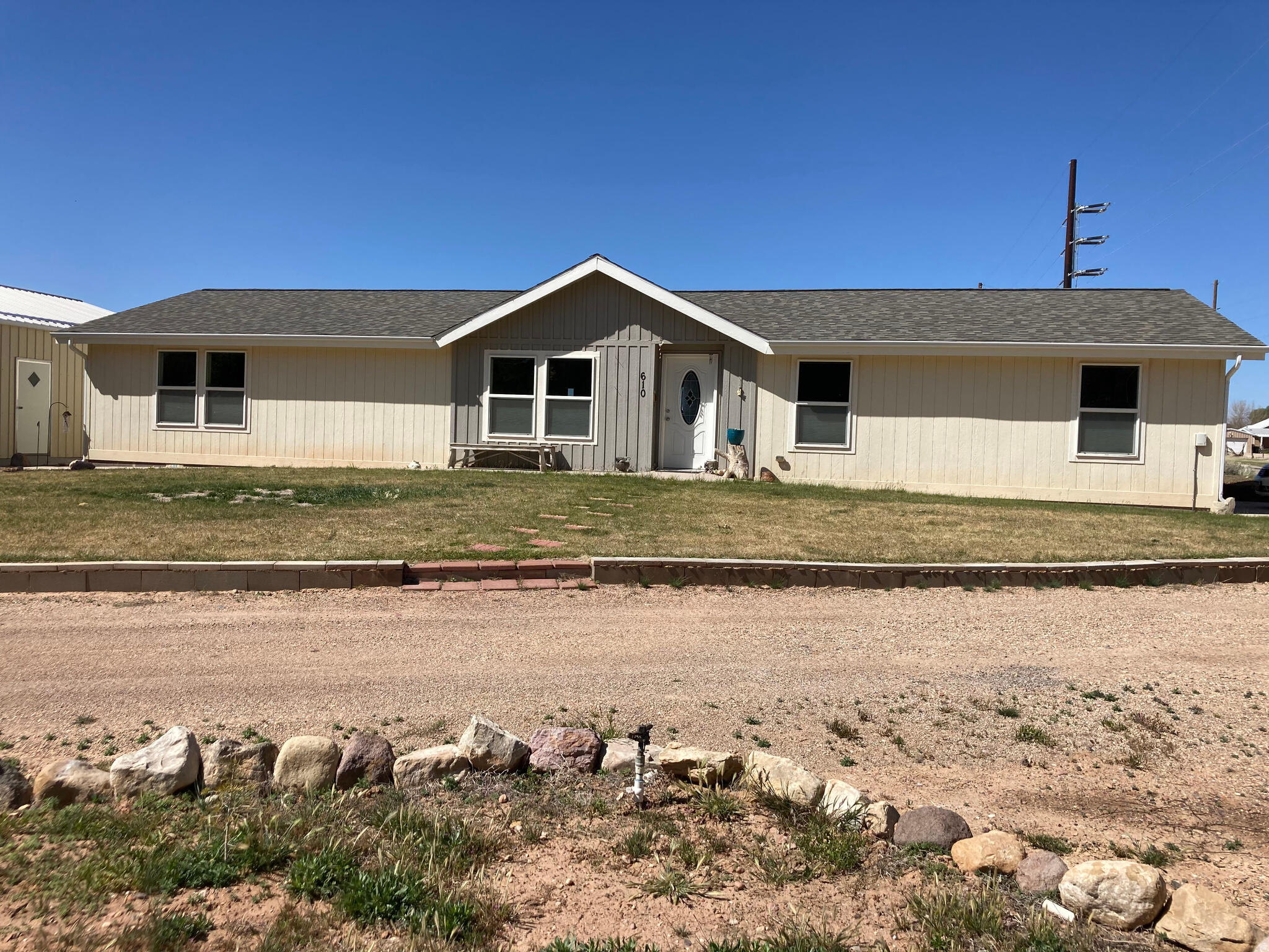 Opportunity to own property in the quiet, historic town of Parowan, just minutes from Brian Head Ski Resort and Cedar Breaks National Monument. Located within city limits, the property allows for animals and is within walking distance to a grocery store, restaurants, pharmacy, and other local businesses. Major shopping and medical facilities are approximately 20-30 minutes away. The property includes a large detached workshop/garage, ideal for a hobby space, complete with a utility sink. A riding lawn mower is included in the sale. Attached to it  is a 600 sq/ft 1-bedroom, 1-bath with a full kitchen ADU currently renting for $1,000/month, offering income potential.  Parowan Creek borders the north side of the property and features a seasonal waterfall. Enjoy nearby mountain views, frequent wildlife sightings, and convenient access to the freeway just 2 miles away, with St. George and Zion National Park about a 1 hour drive.
