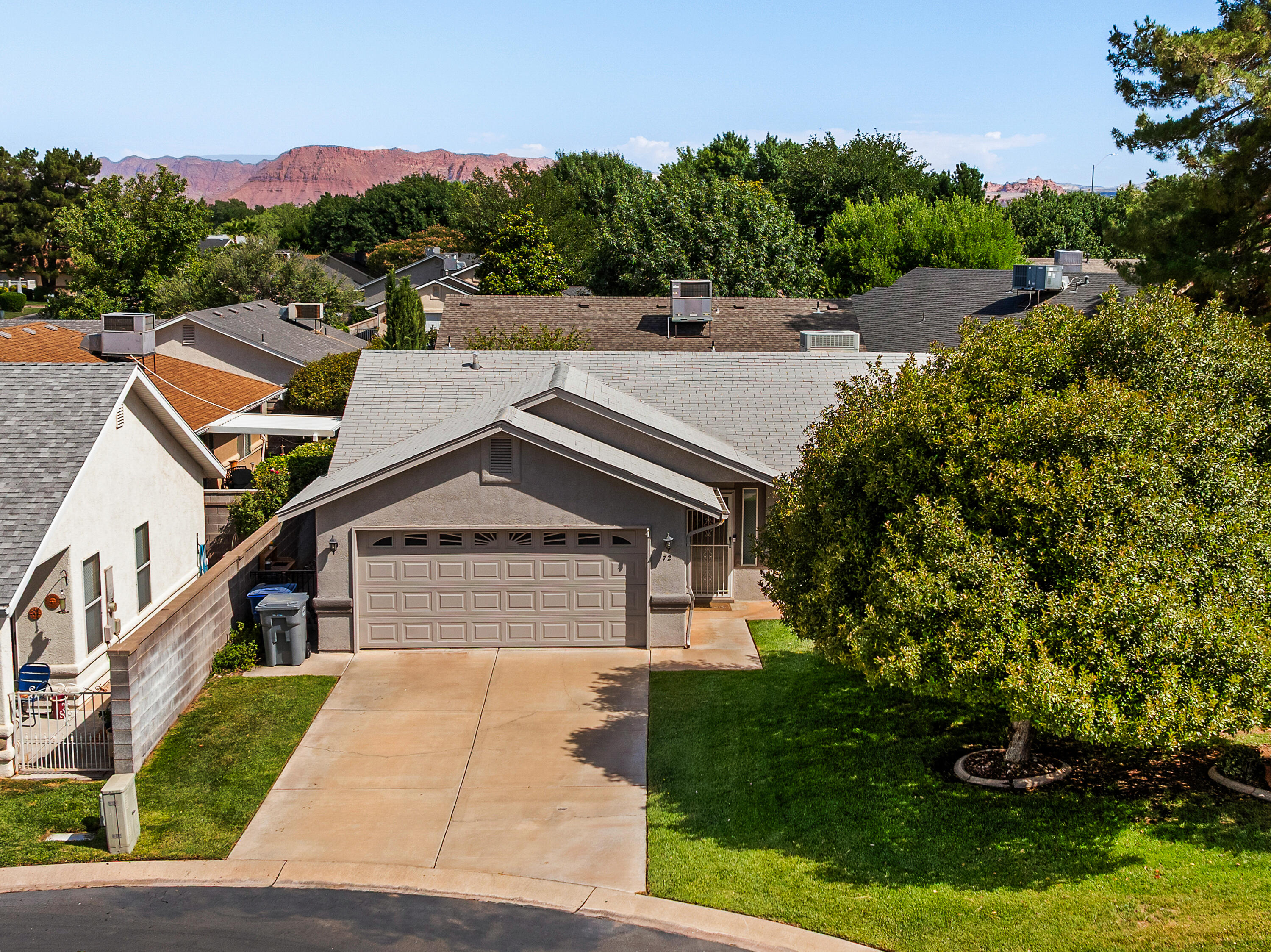 Some homes simply feel right the moment you walk through the door. Warm, inviting, and move-in ready, this beautifully refreshed townhome offers a comfortable retreat in a uniquely scenic setting beneath Black Hill and near the Santa Clara River corridor. Updated paint, carpet, and appliances create a fresh, welcoming atmosphere, while the generous outdoor living space provides room to relax, entertain, garden, or enjoy Southern Utah's sunshine. Step outside and explore nearby trails, parks, and everyday conveniences, all just minutes away. Opportunities to own a home with this combination of charm, location, and livability don't come along often. Come see why this one feels like home.