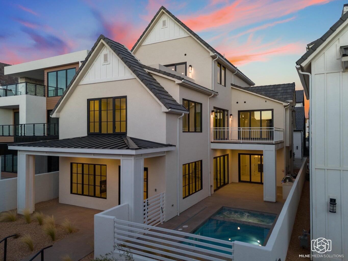 Seller incentive! $50,000 credit at closing! This home offers an unparalleled luxurious vacation rental experience in Desert Color Resort. Spanning 3 levels, this beautiful residence has 7 bedrooms, 7 full baths, and 3 half baths, with the ability to sleep 20+. Each floor features a spacious gathering room, complemented by expansive patios on the main and third levels. This home has a private pool & spa as well as access to Desert Color's incredible amenities. Resort amenities include a 2.5-acre lagoon, heated pool, pickleball courts, snack shack, and BigShots Golf, and more, all located just a short walk from this home. Owners can use the home personally as much as they'd like and rent out any unused dates to earn additional income!