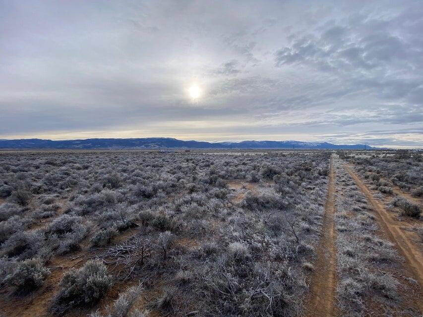 Quiet country-like setting but still close to town on this great 1.25 acre lot in Cedar Valley Acres, beautiful views of the mountains and valley. No utilities to property. Buyer to verify all information.