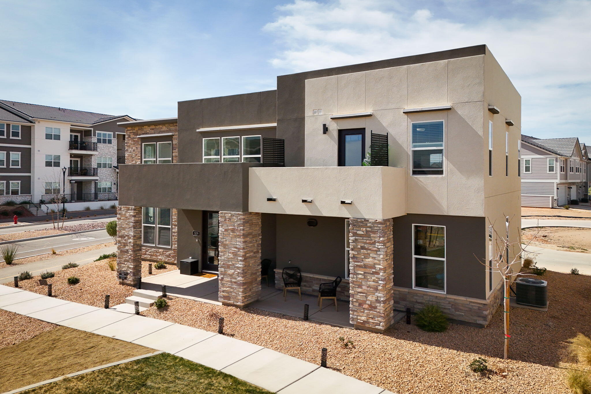 See one of the most affordable standalone homes in Desert Color! This freestanding townhome was carefully placed on one the best lots in Sage Haven with green space and views of Crimson Cliffs in the distance. You will love the soaring vaulted ceilings and primary bedroom balcony. Tasteful upgrades throughout the home and super-deep garage make this a must see!