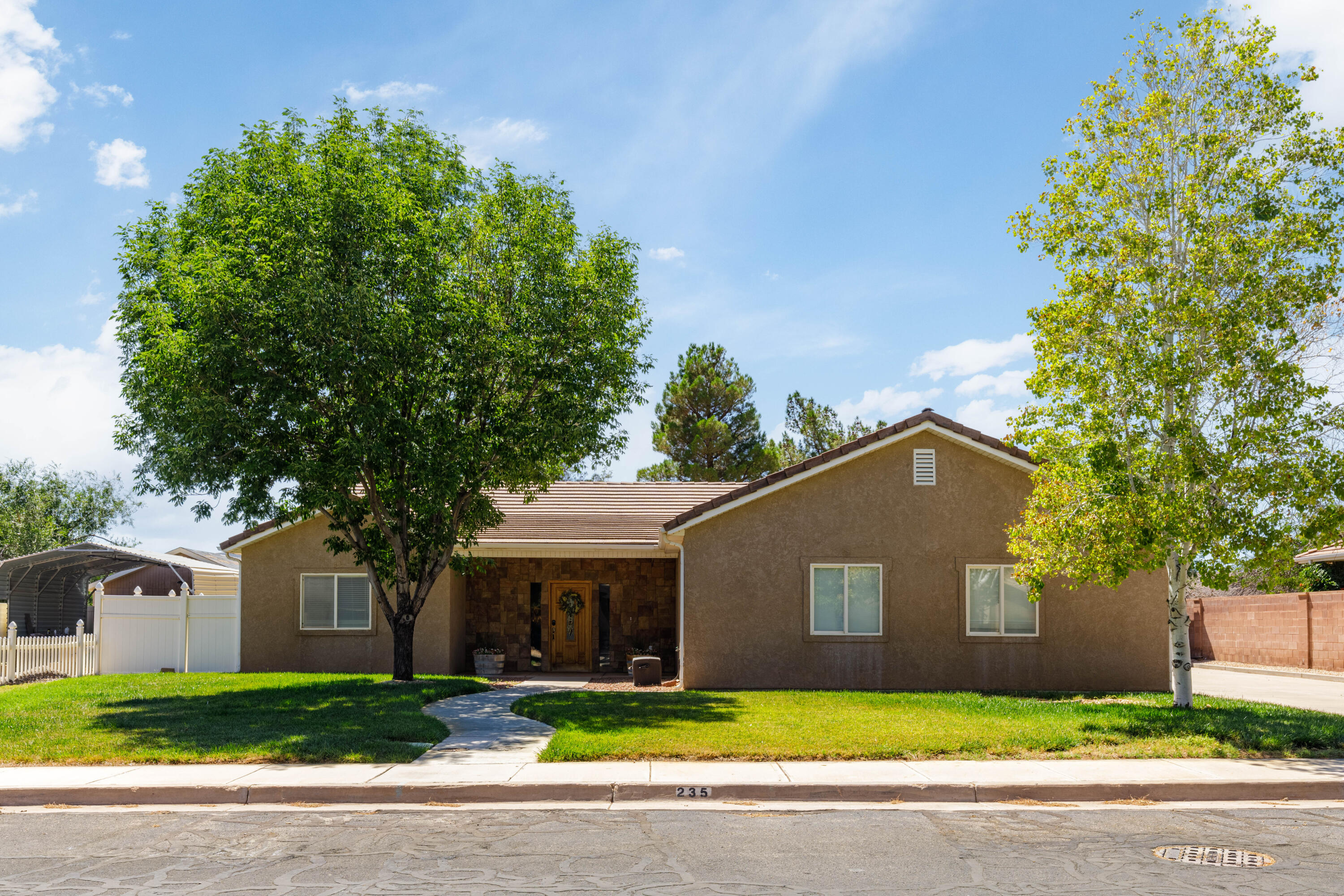 Built for those who want the freedom to live, work, and store it all in one place. This 4 bed, 2 bath home sits on a quiet dead-end road with no HOA giving you the flexibility to run a business, store your toys, or simply save on costly storage. The 737 sq ft metal shop, expansive concrete pad, and ample space for RVs, trailers, and equipment make this property a rare find. Inside, enjoy granite countertops, stainless appliances, new fireplace, fresh carpet, and a freestanding tub. End your day in the hot tub and enjoy the ease of small-town living